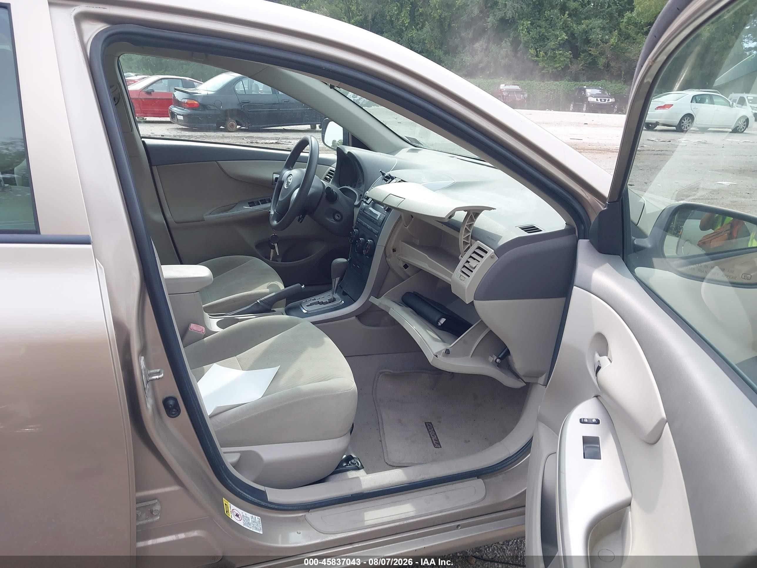 2010 Toyota Corolla Le Tan vin: 1NXBU4EE2AZ204992