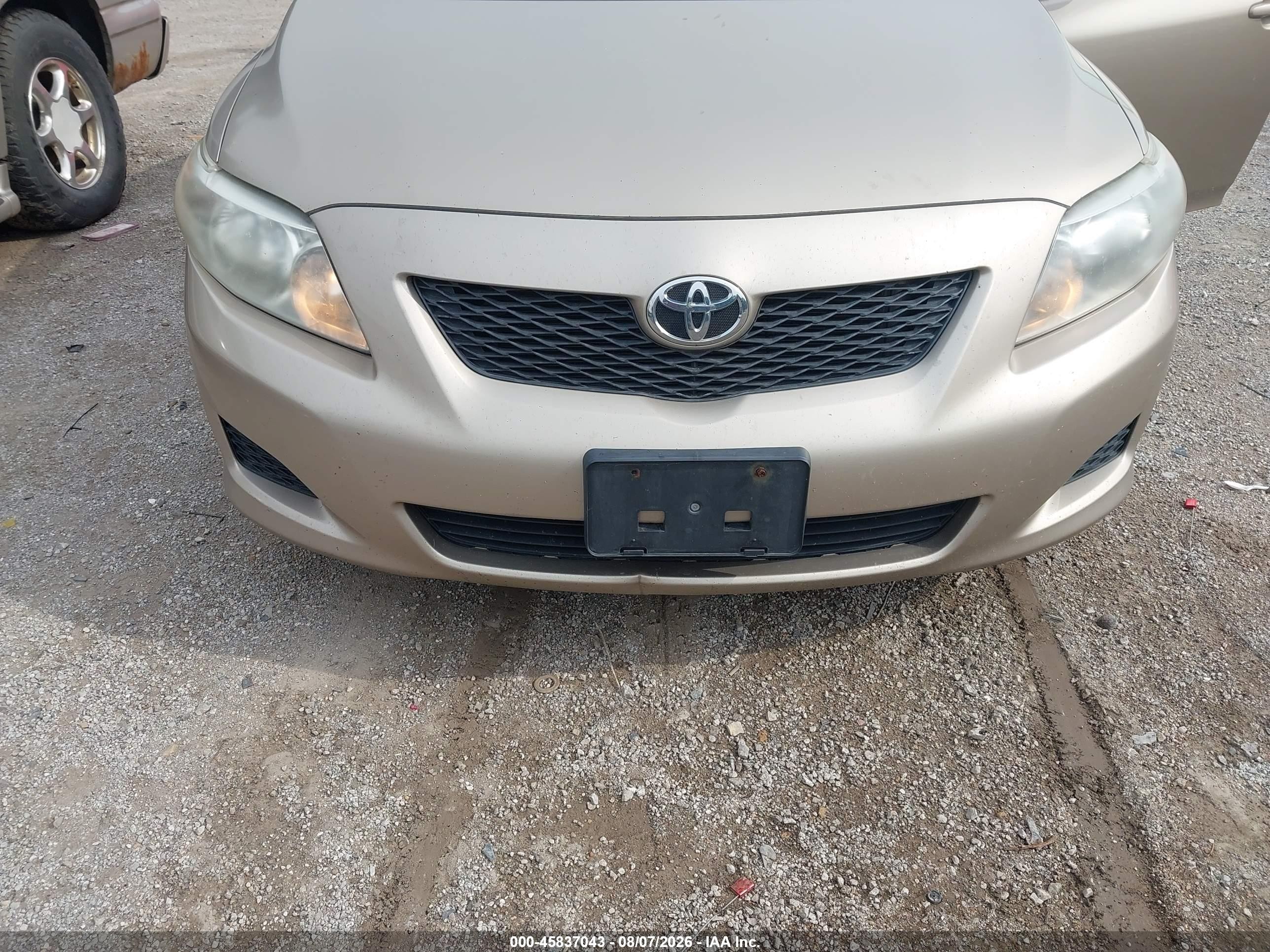 2010 Toyota Corolla Le Tan vin: 1NXBU4EE2AZ204992