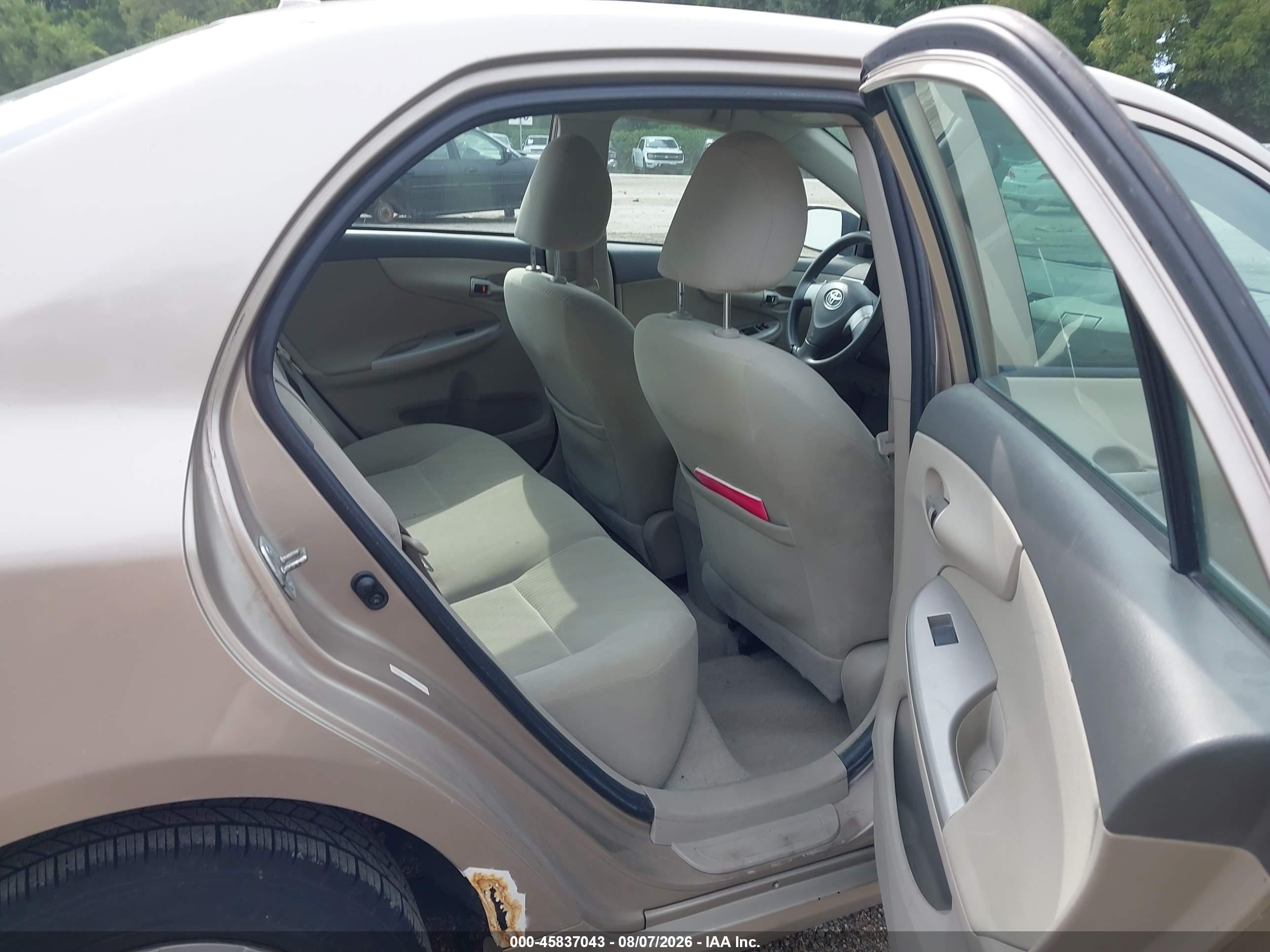 2010 Toyota Corolla Le Tan vin: 1NXBU4EE2AZ204992