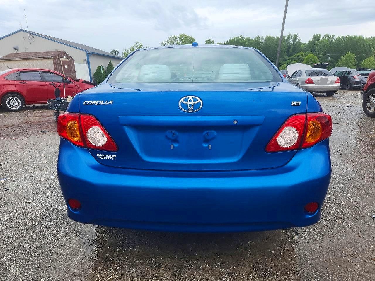 2010 Toyota Corolla Le Blue vin: 1NXBU4EE2AZ239774