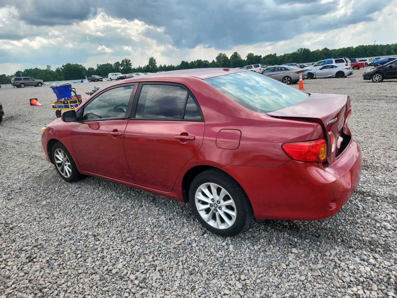 2010 Toyota Corolla Le Red vin: 1NXBU4EE2AZ272290