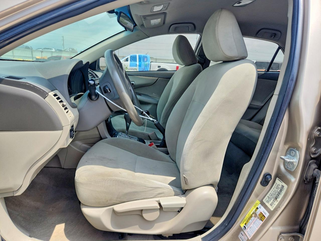 2010 Toyota Corolla Le Tan vin: 1NXBU4EE2AZ276324