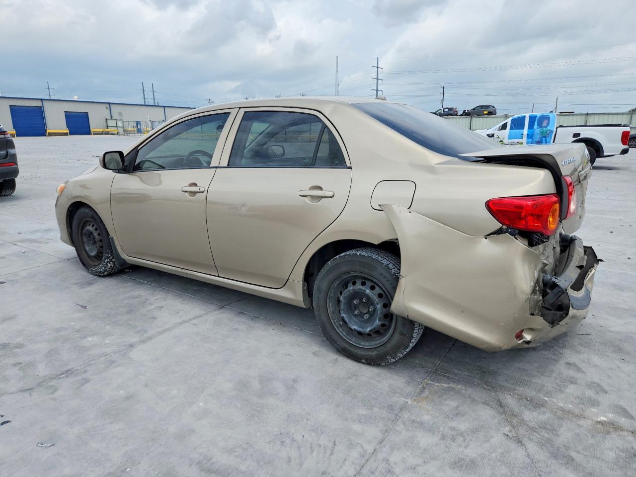 2010 Toyota Corolla Le Tan vin: 1NXBU4EE2AZ276324