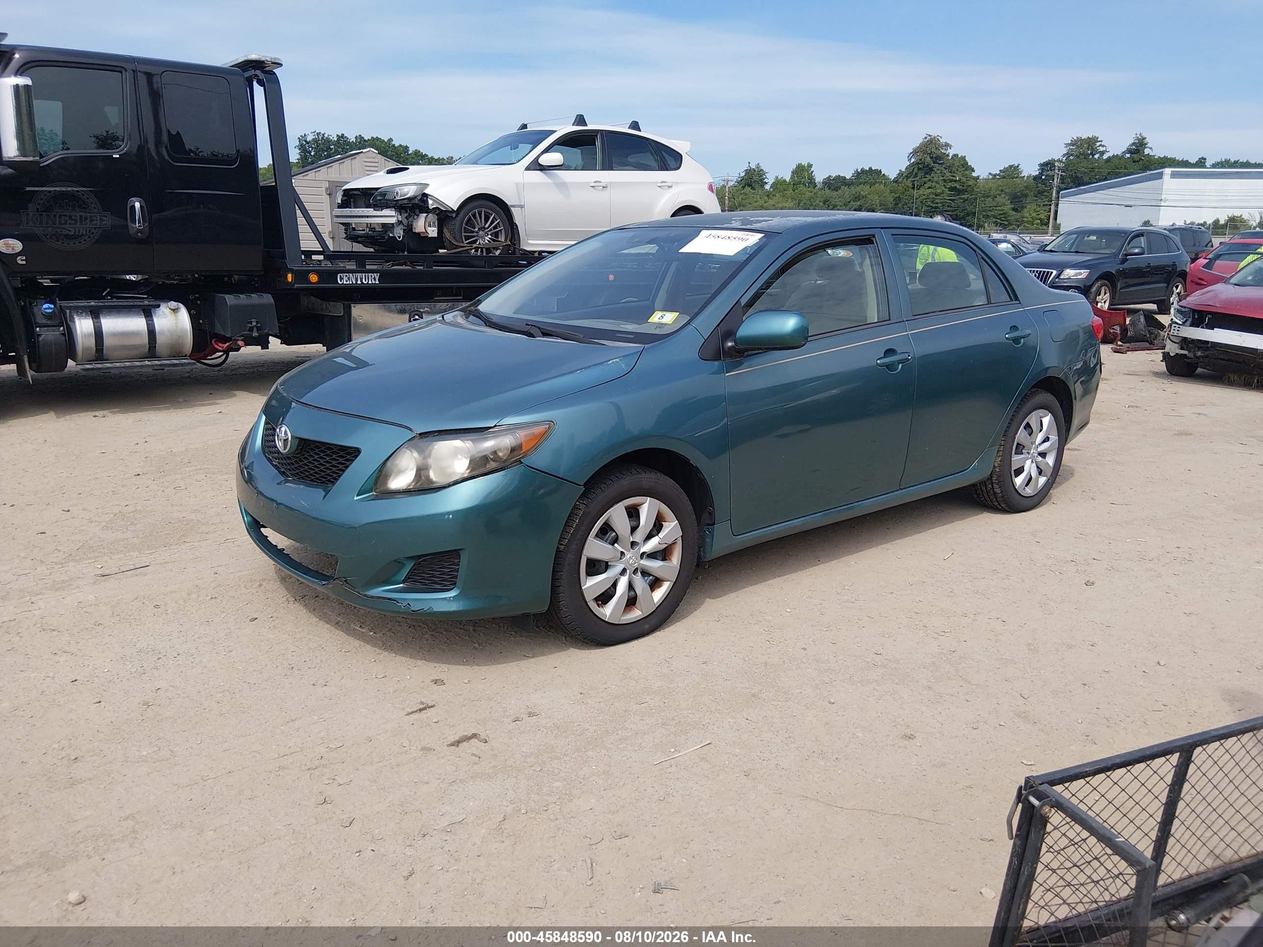 2010 Toyota Corolla Le Teal vin: 1NXBU4EE2AZ319656