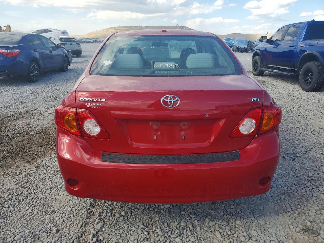 2010 Toyota Corolla Le Red vin: 1NXBU4EE2AZ356612