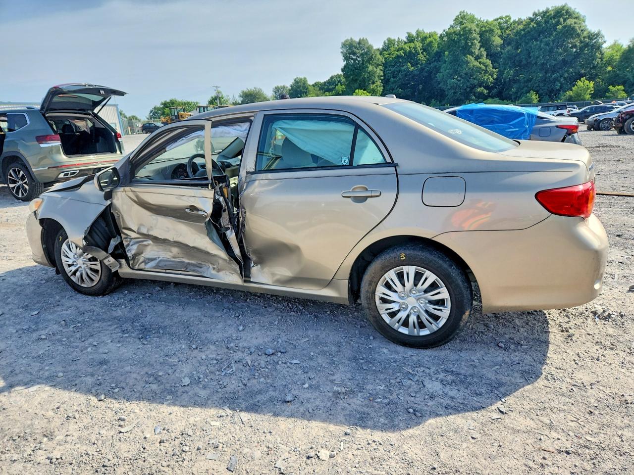 2010 Toyota Corolla Le Gold vin: 1NXBU4EE3AZ184316