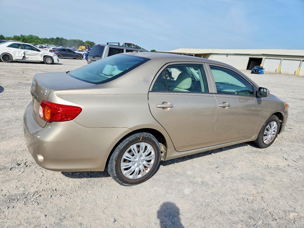 2010 Toyota Corolla Le Gold vin: 1NXBU4EE3AZ184316