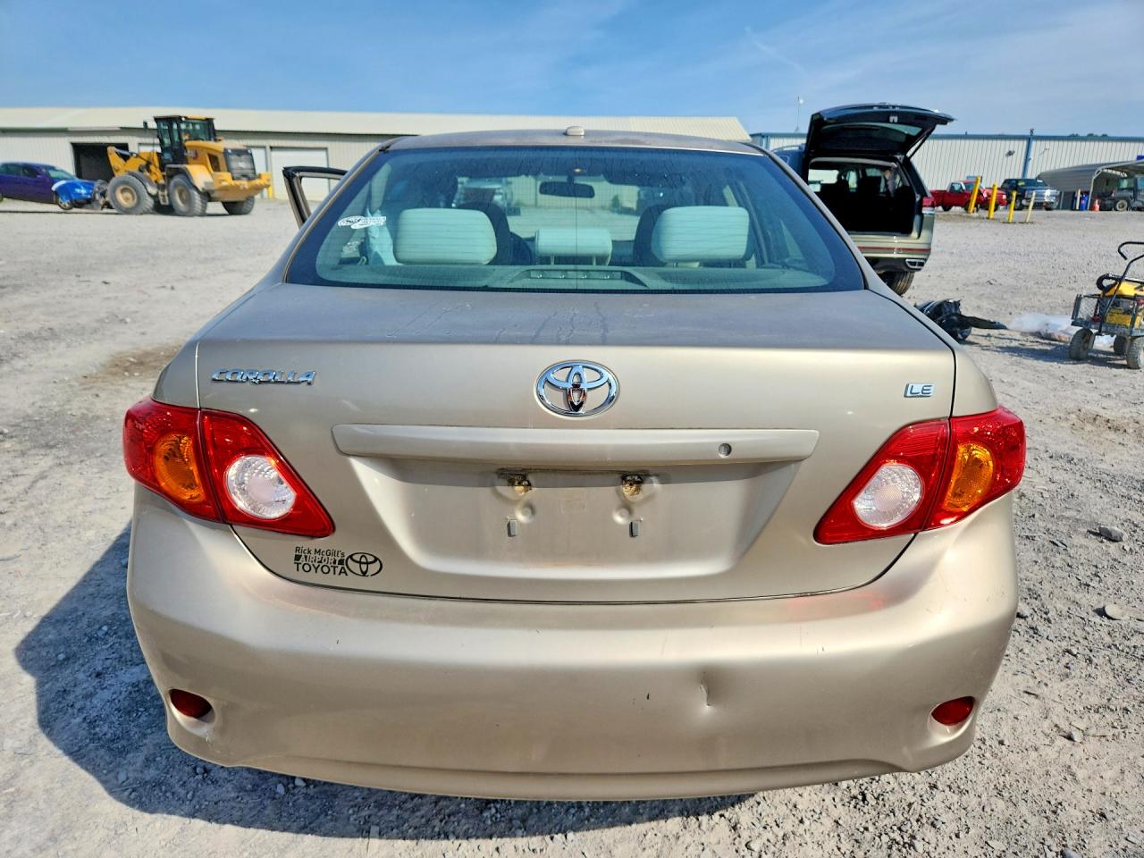 2010 Toyota Corolla Le Gold vin: 1NXBU4EE3AZ184316