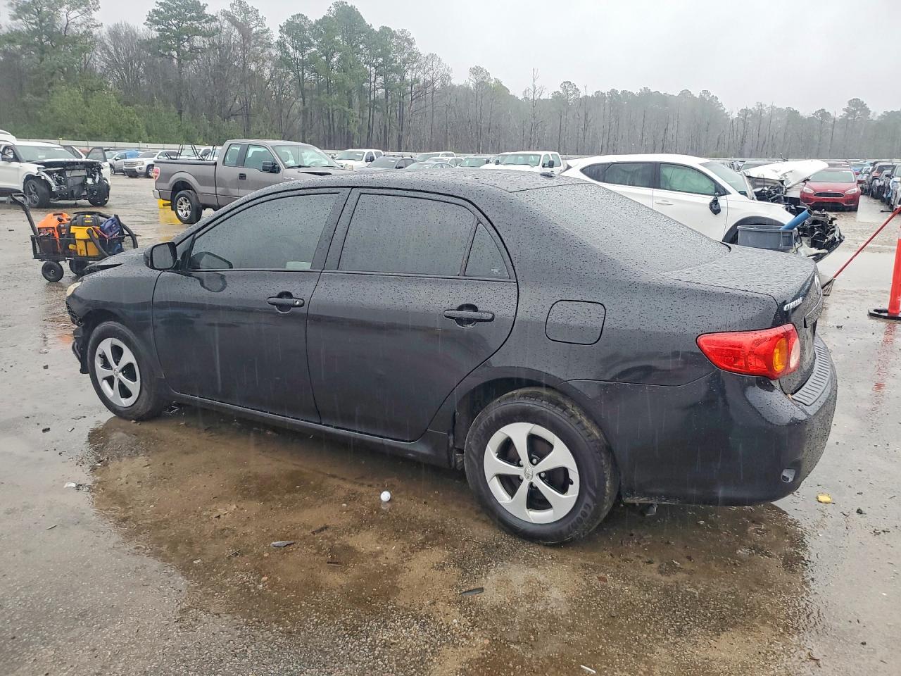2010 Toyota Corolla Le Black vin: 1NXBU4EE3AZ210090