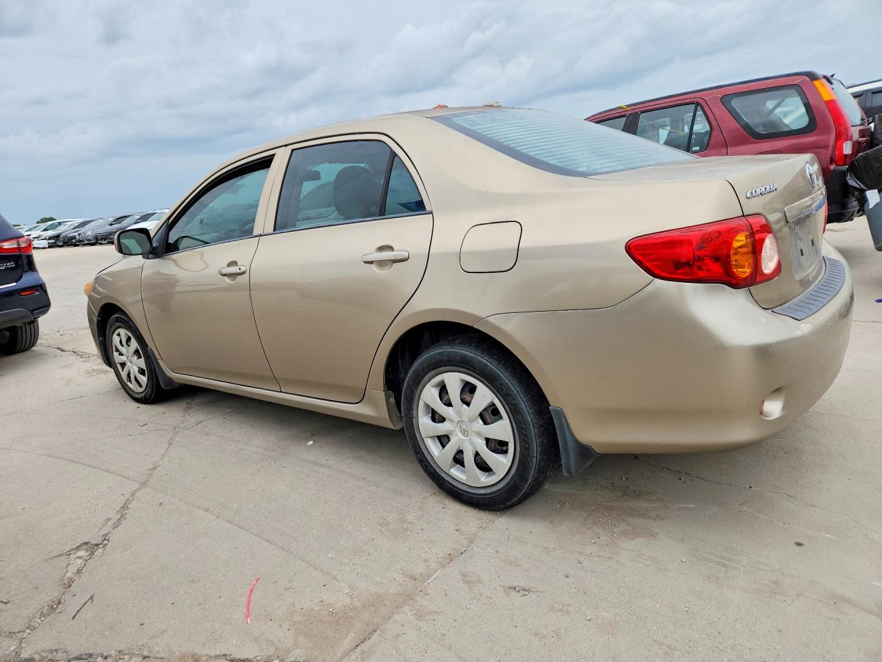 2010 Toyota Corolla Le Gold vin: 1NXBU4EE3AZ237757