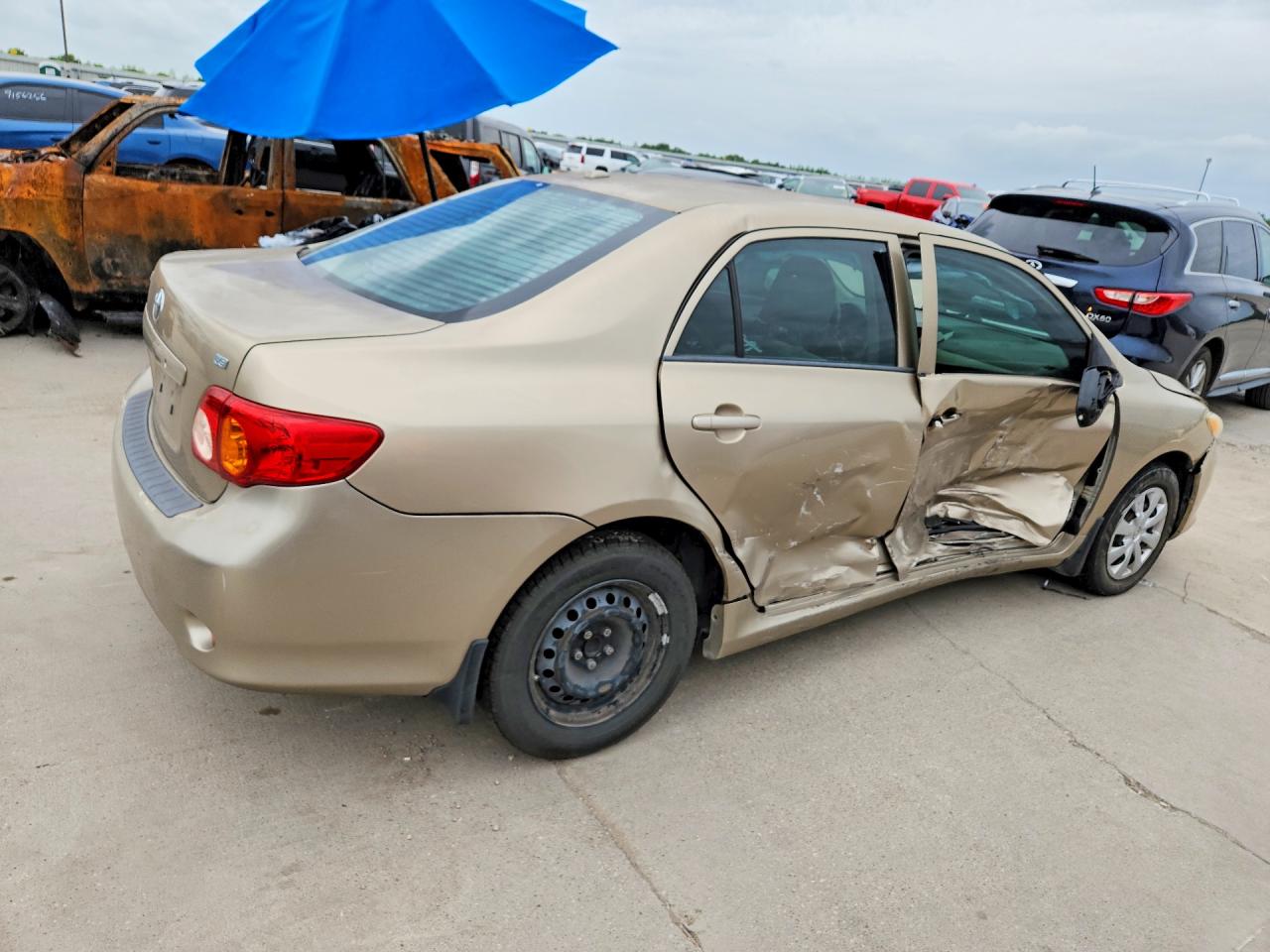 2010 Toyota Corolla Le Gold vin: 1NXBU4EE3AZ237757