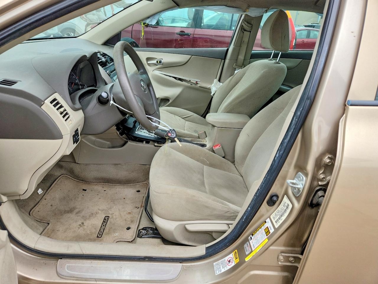2010 Toyota Corolla Le Gold vin: 1NXBU4EE3AZ237757