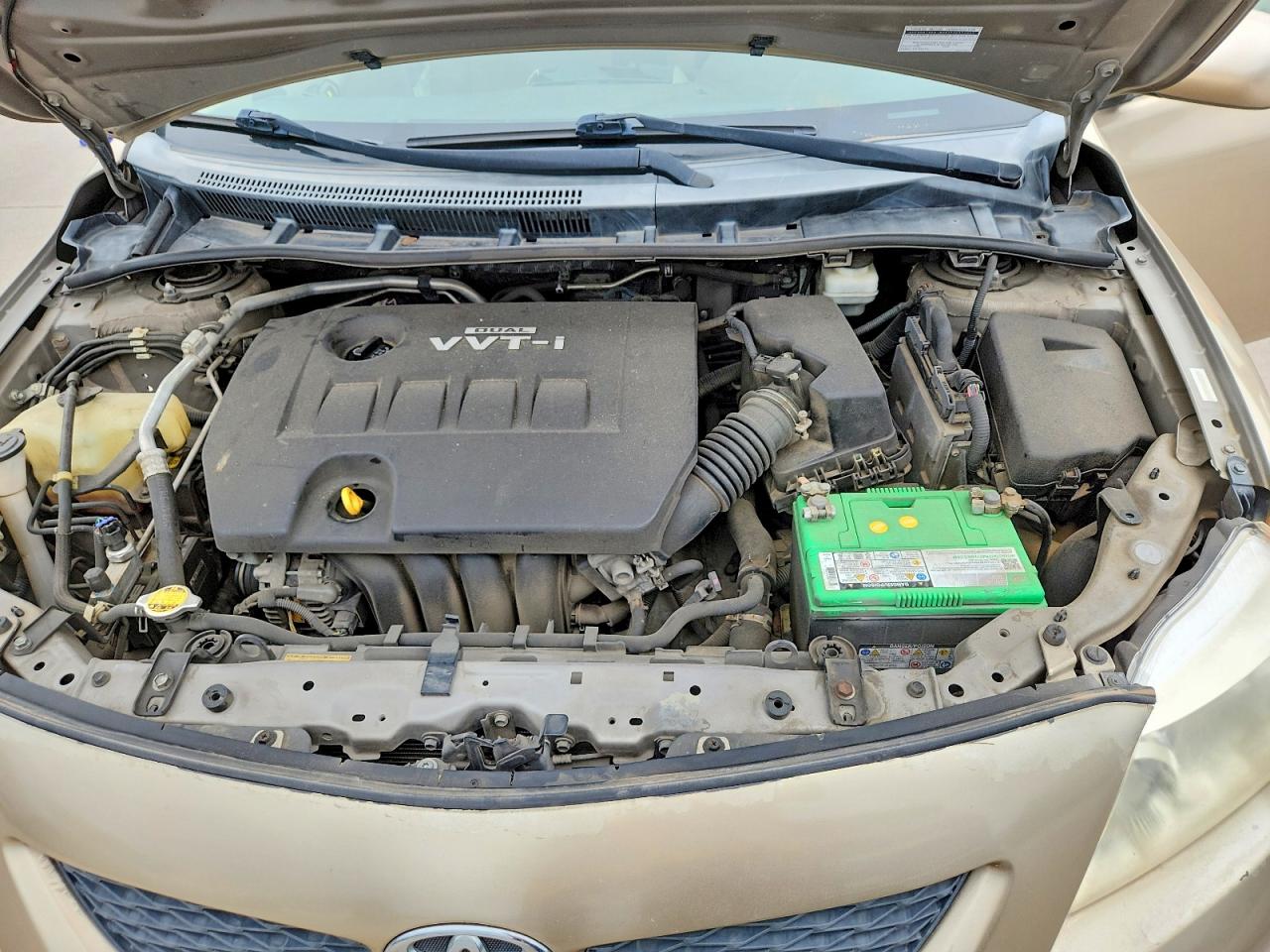 2010 Toyota Corolla Le Gold vin: 1NXBU4EE3AZ237757