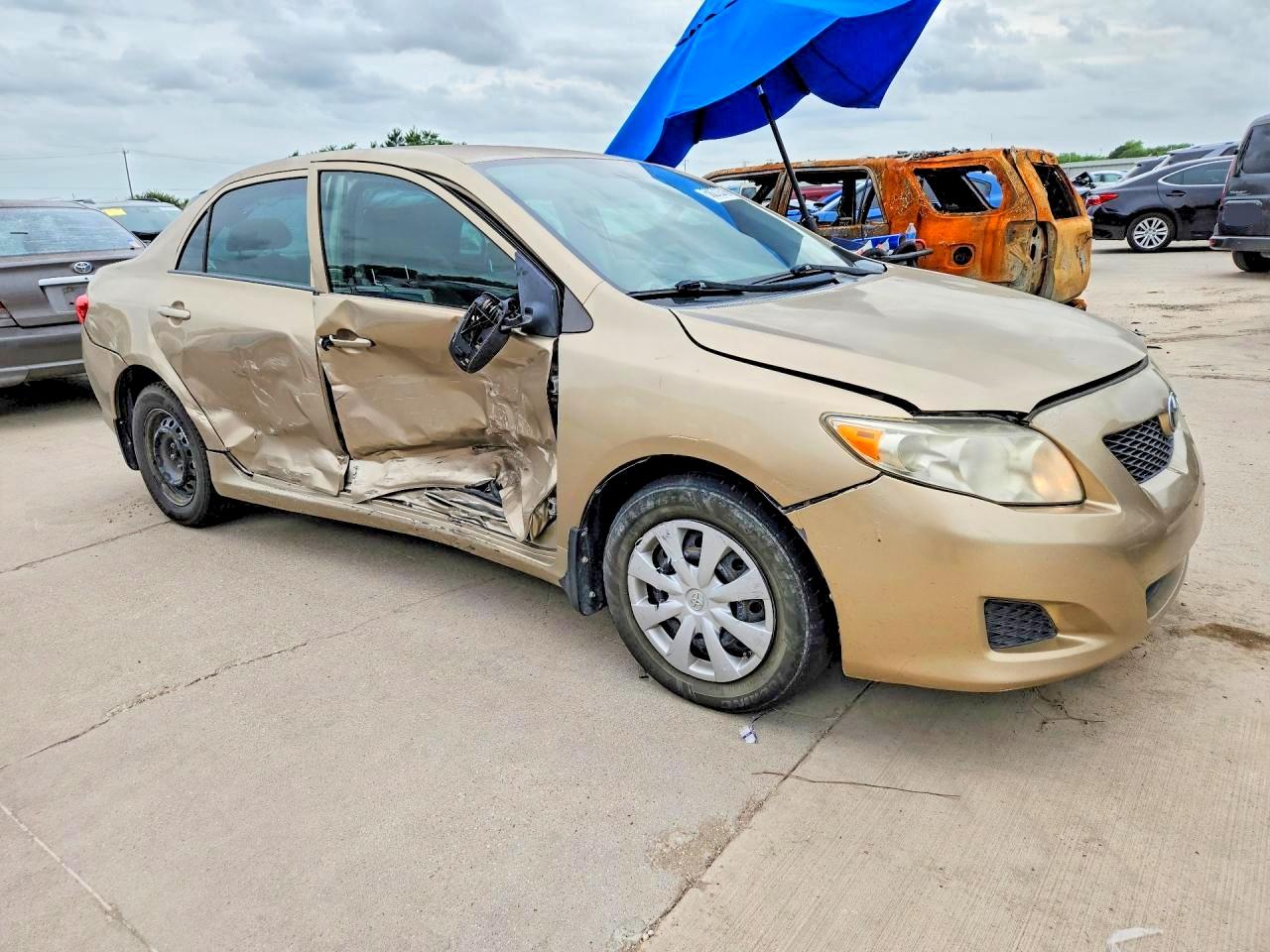2010 Toyota Corolla Le Gold vin: 1NXBU4EE3AZ237757
