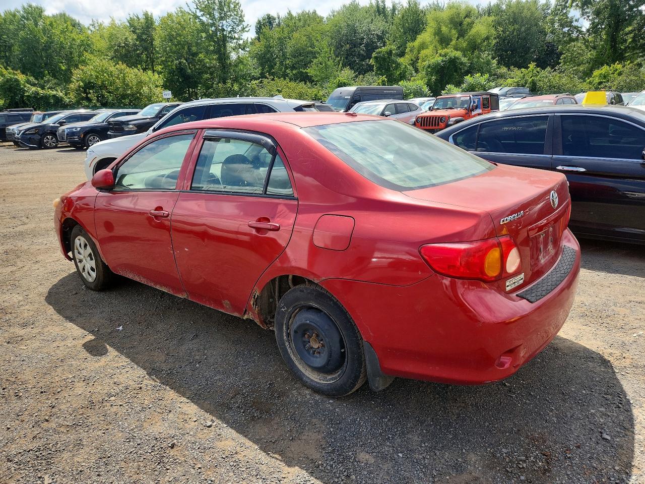 2010 Toyota Corolla Le Red vin: 1NXBU4EE3AZ310464