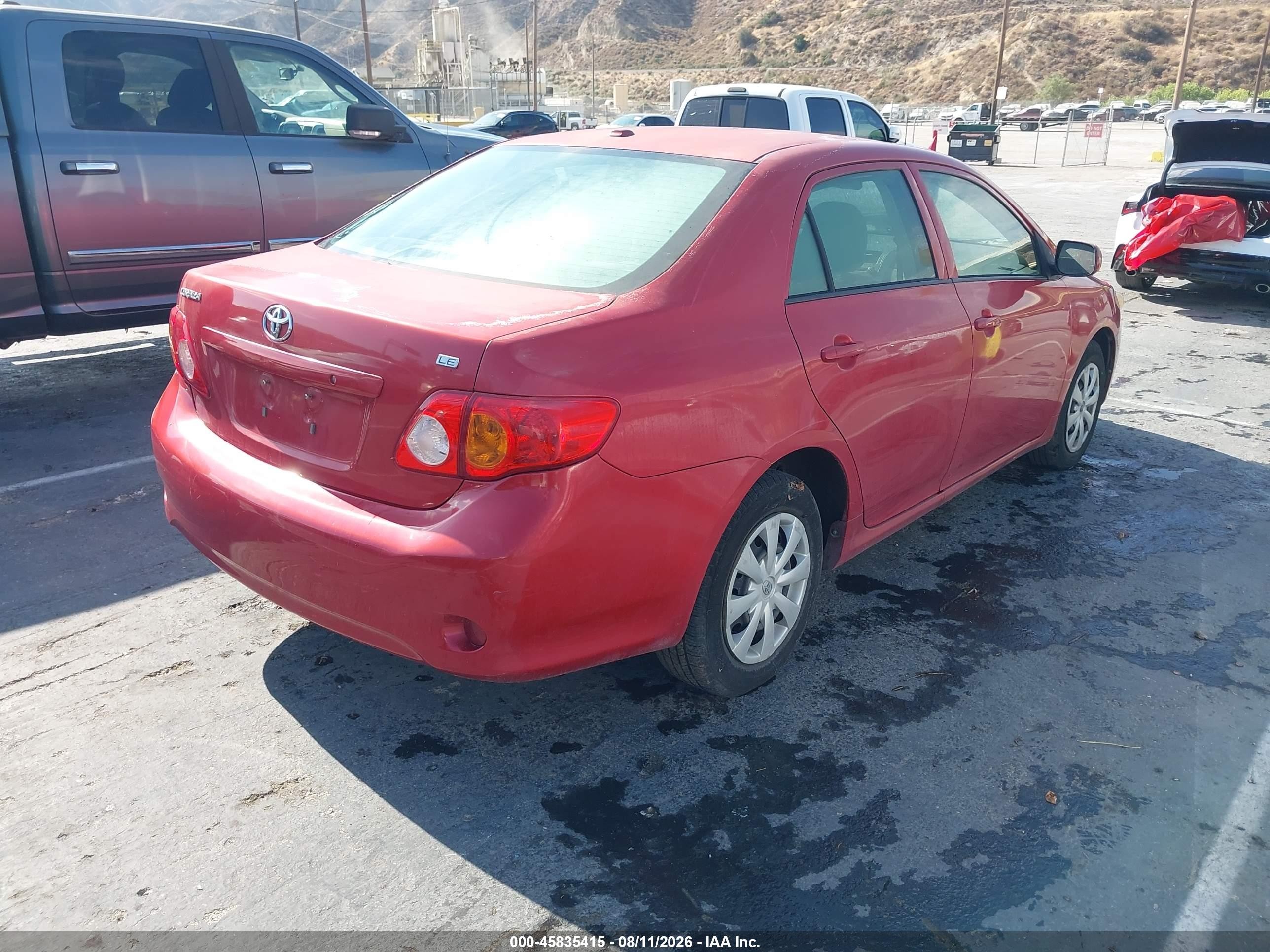 2010 Toyota Corolla Le Red vin: 1NXBU4EE3AZ375668