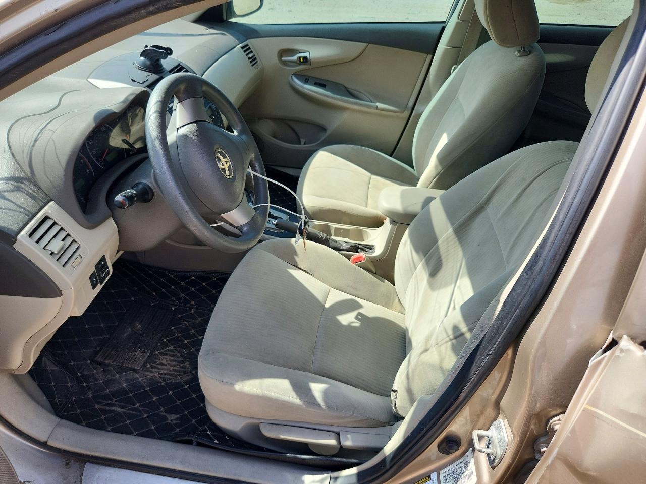 2010 Toyota Corolla Le Beige vin: 1NXBU4EE4AZ177844
