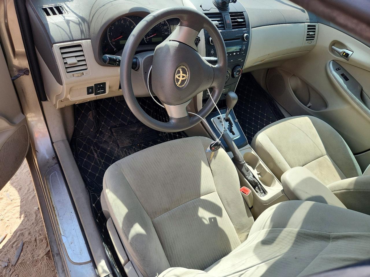 2010 Toyota Corolla Le Beige vin: 1NXBU4EE4AZ177844