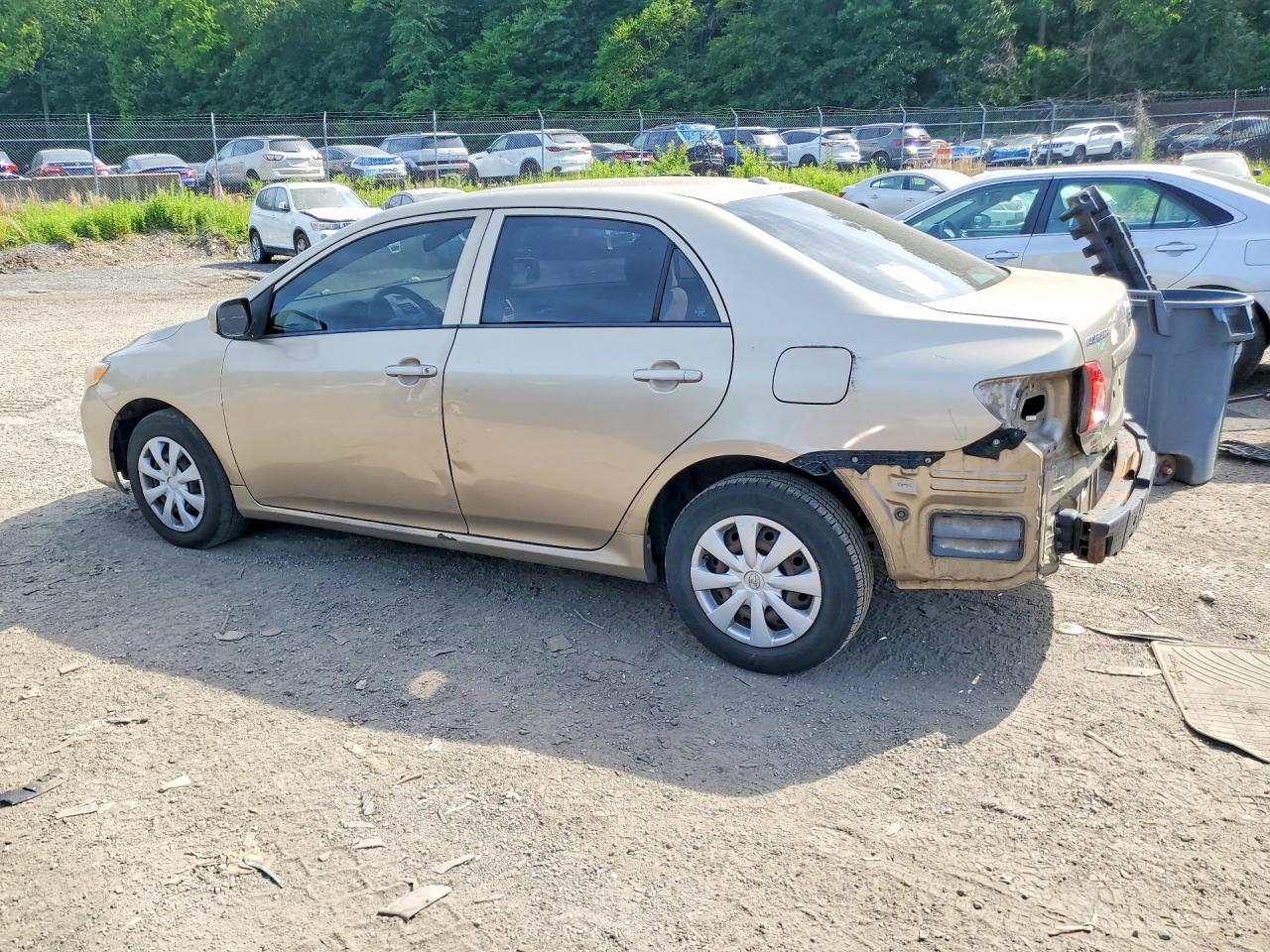 2010 Toyota Corolla Le Gold vin: 1NXBU4EE4AZ191257