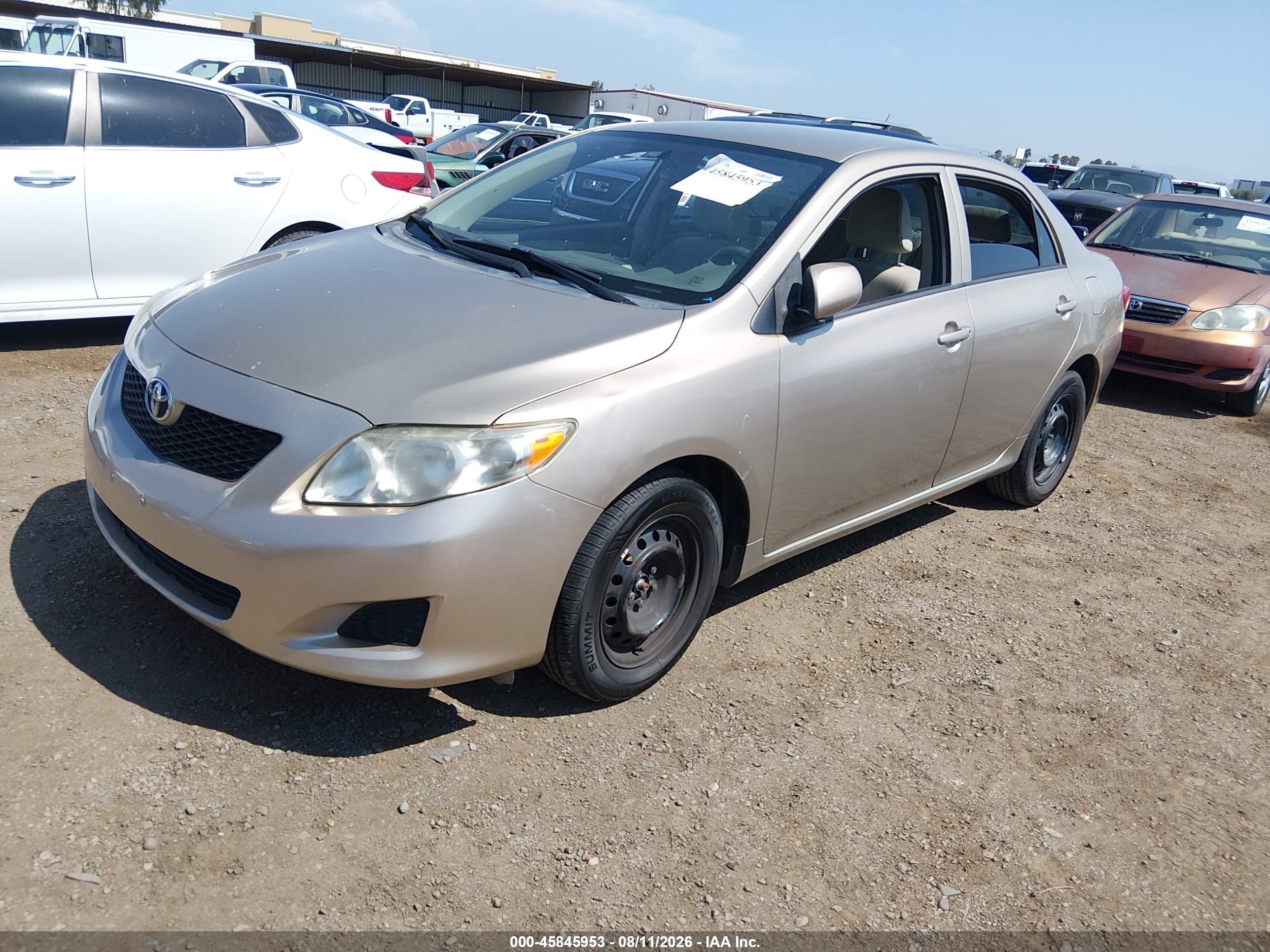 2010 Toyota Corolla Le Beige vin: 1NXBU4EE4AZ202516