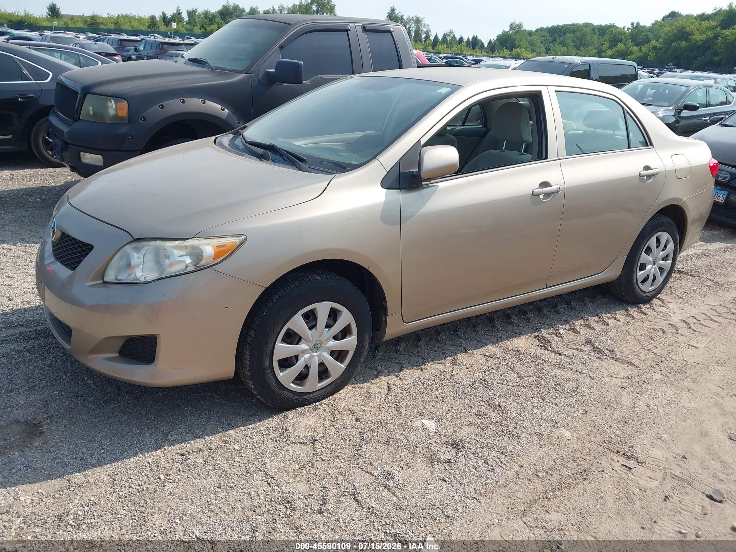 2010 Toyota Corolla Le Champagne vin: 1NXBU4EE4AZ220840