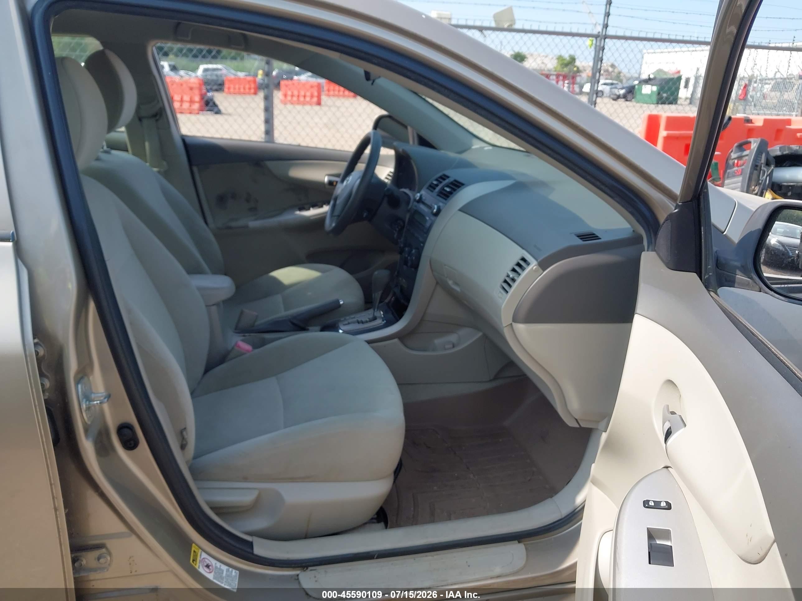 2010 Toyota Corolla Le Champagne vin: 1NXBU4EE4AZ220840