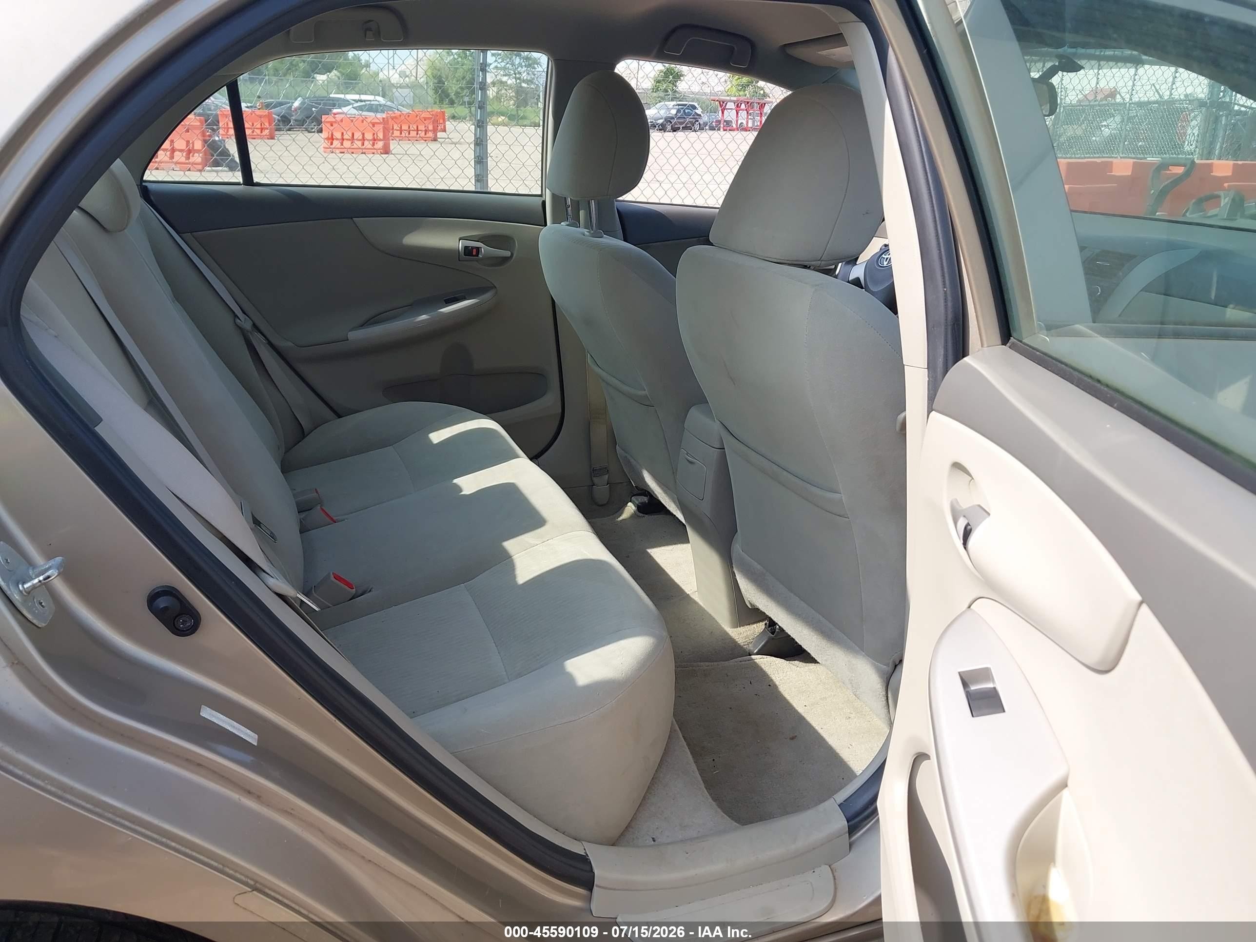 2010 Toyota Corolla Le Champagne vin: 1NXBU4EE4AZ220840