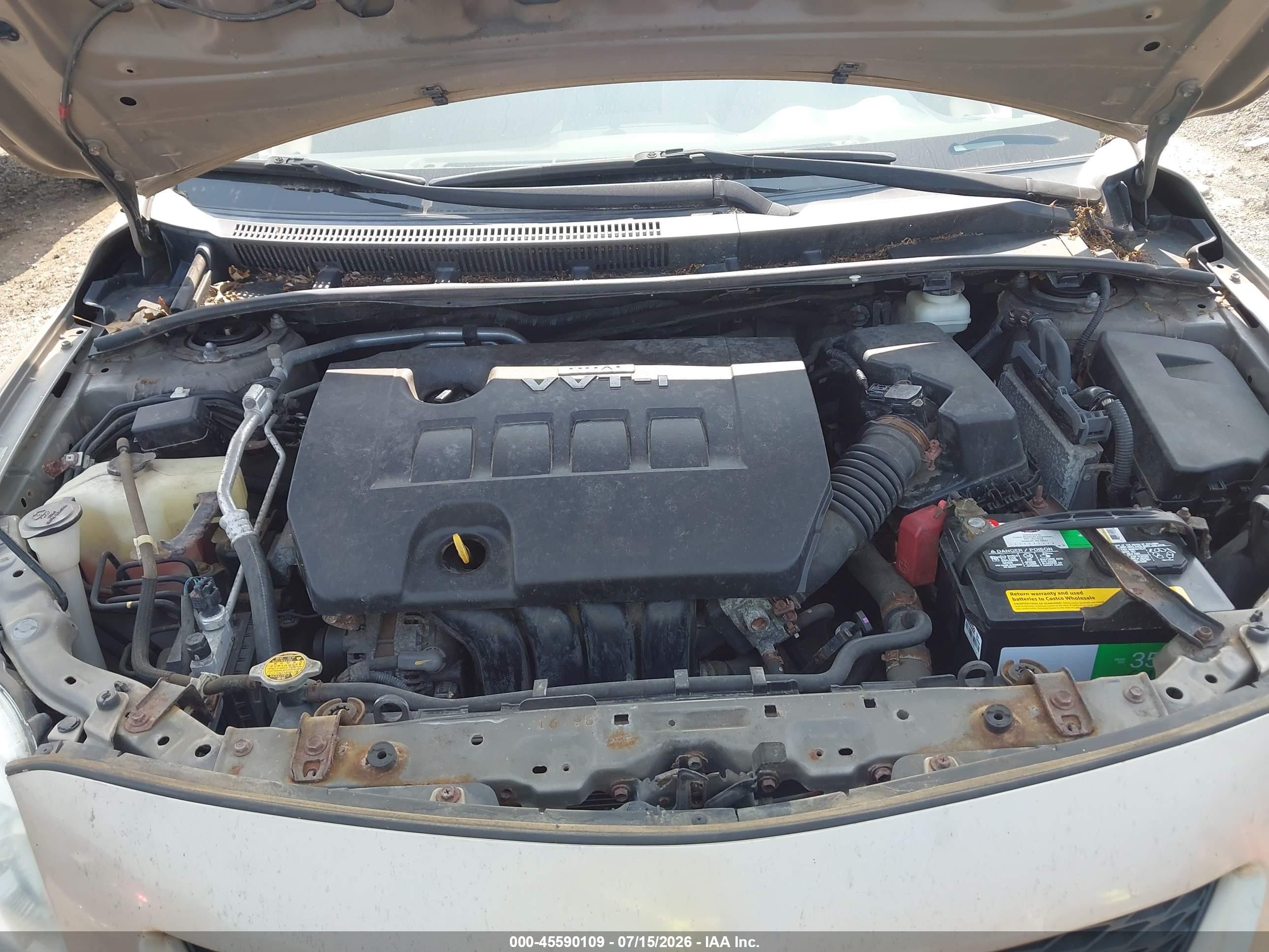 2010 Toyota Corolla Le Champagne vin: 1NXBU4EE4AZ220840