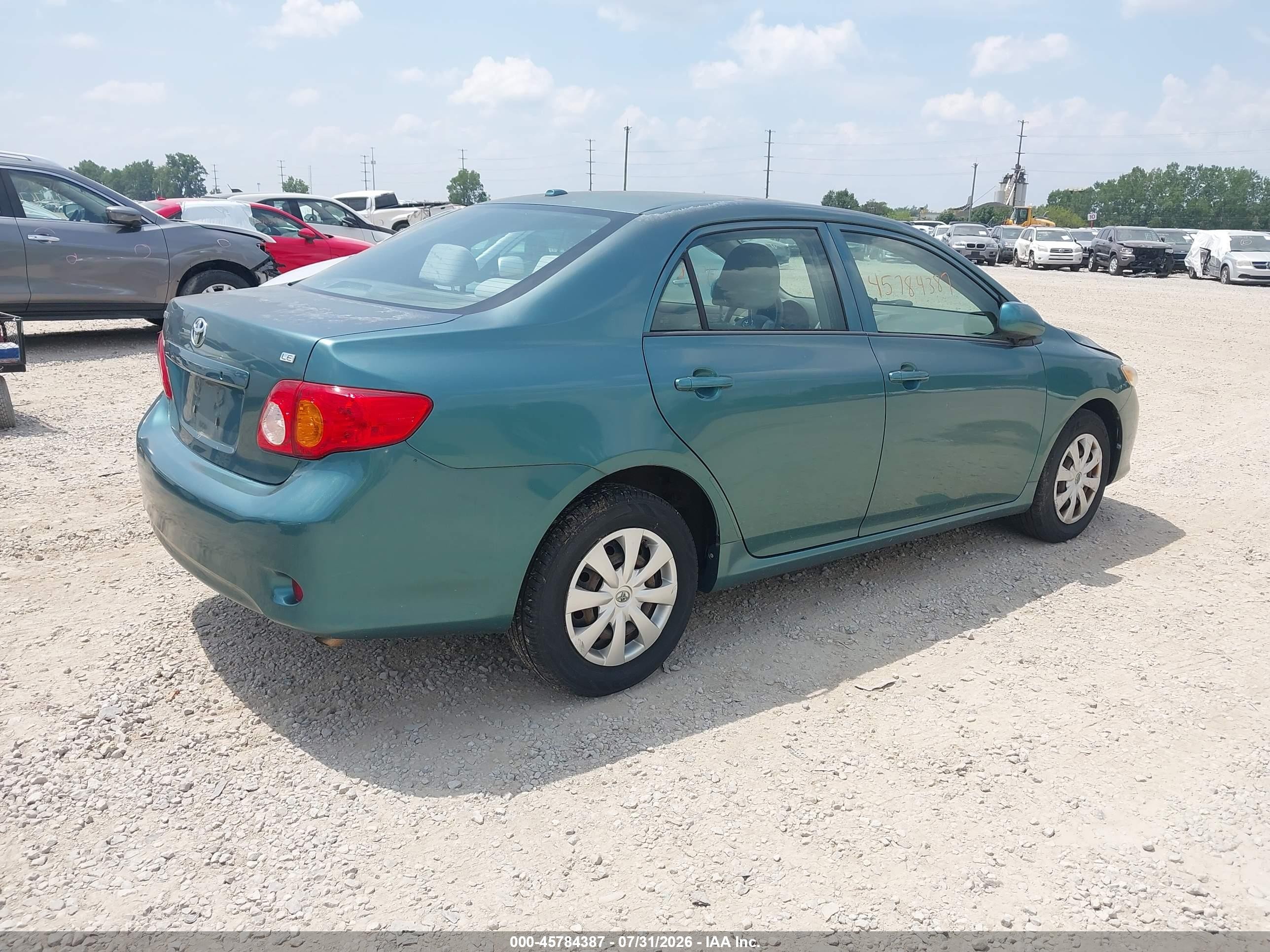 2010 Toyota Corolla Le Teal vin: 1NXBU4EE4AZ235709