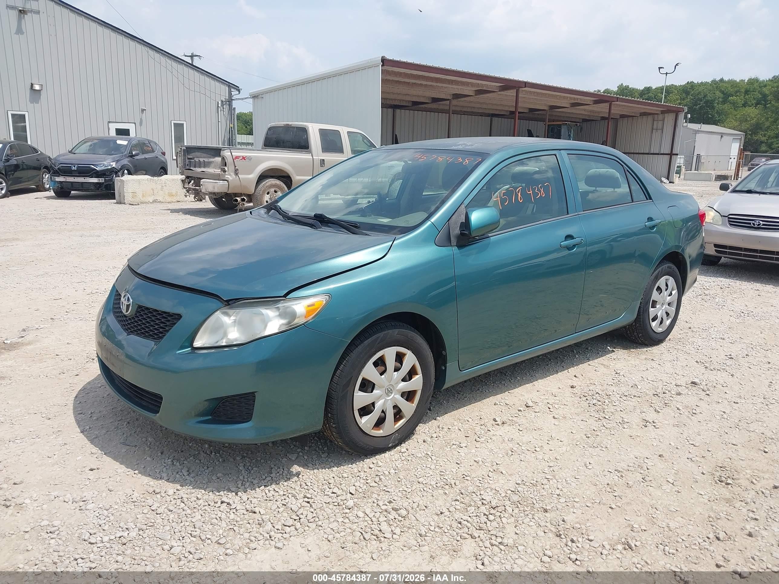 2010 Toyota Corolla Le Teal vin: 1NXBU4EE4AZ235709