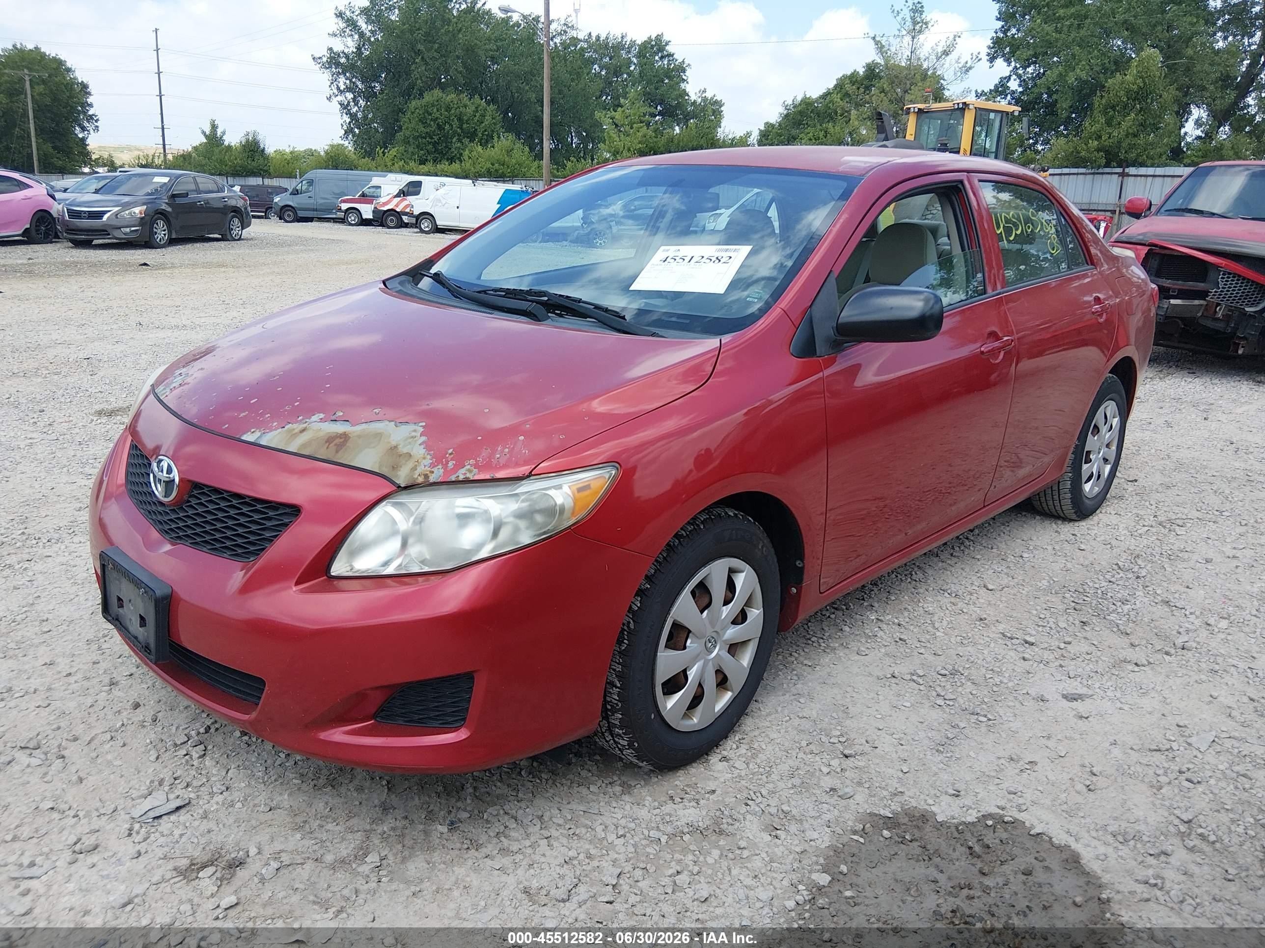 2010 Toyota Corolla   Red vin: 1NXBU4EE4AZ246838