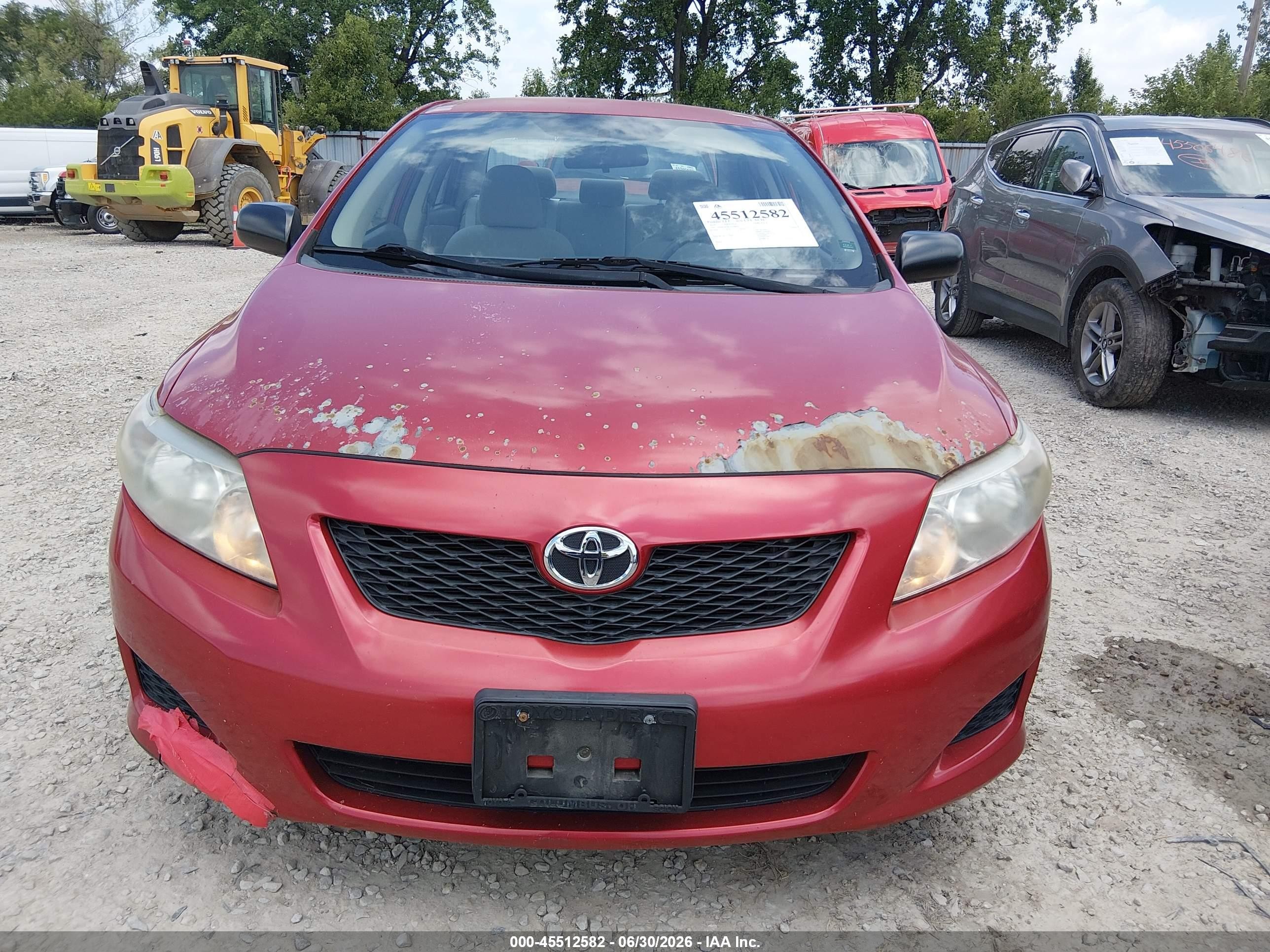 2010 Toyota Corolla   Red vin: 1NXBU4EE4AZ246838