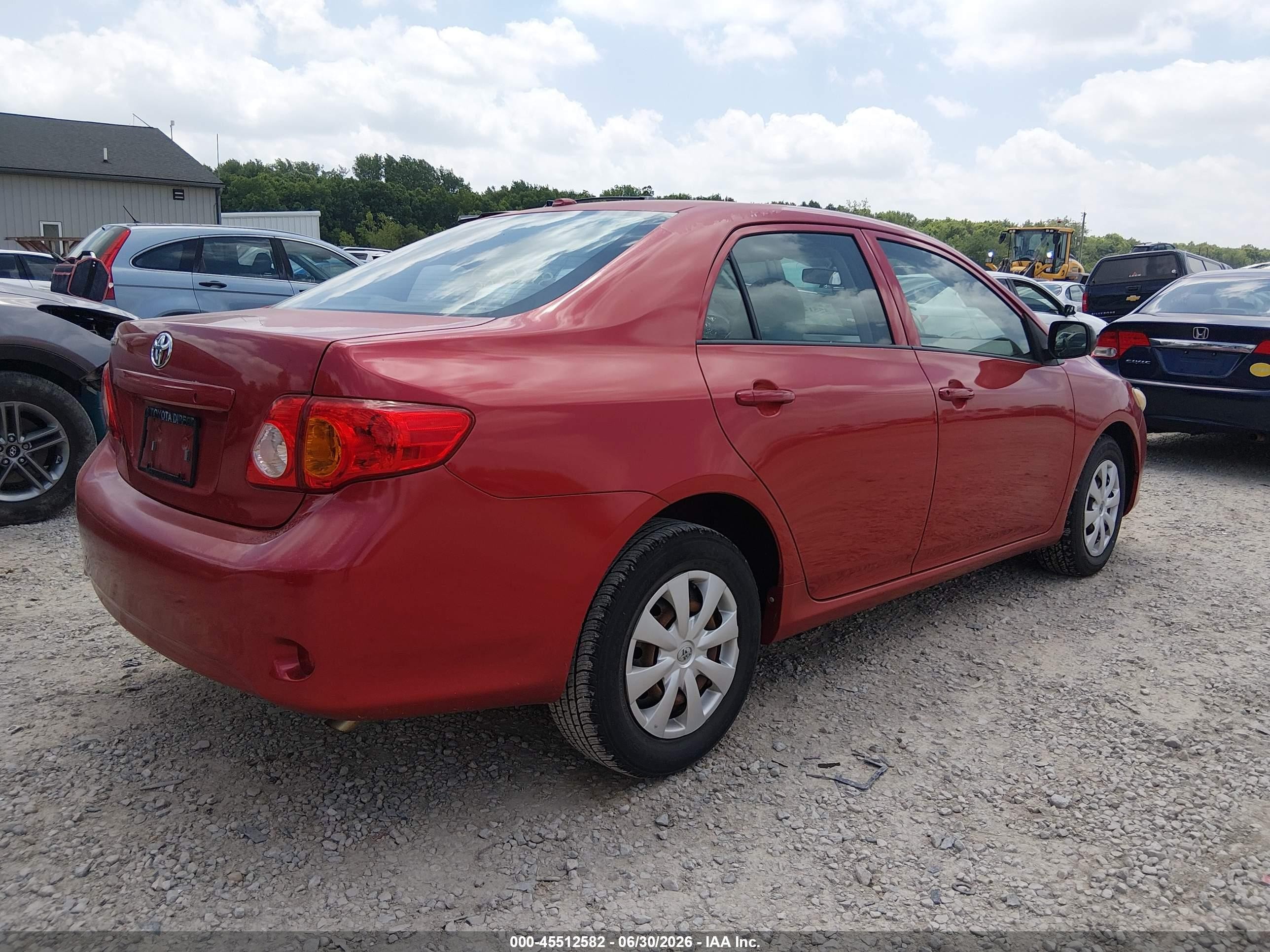 2010 Toyota Corolla   Red vin: 1NXBU4EE4AZ246838