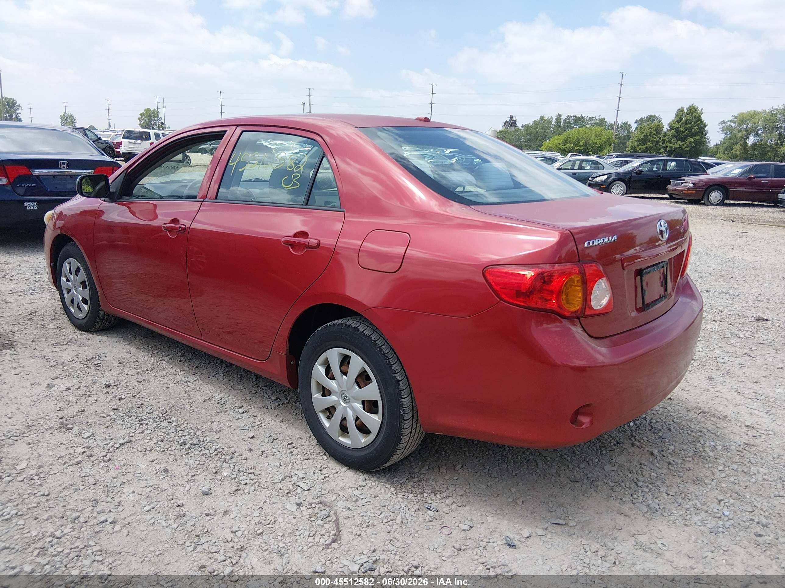 2010 Toyota Corolla   Red vin: 1NXBU4EE4AZ246838