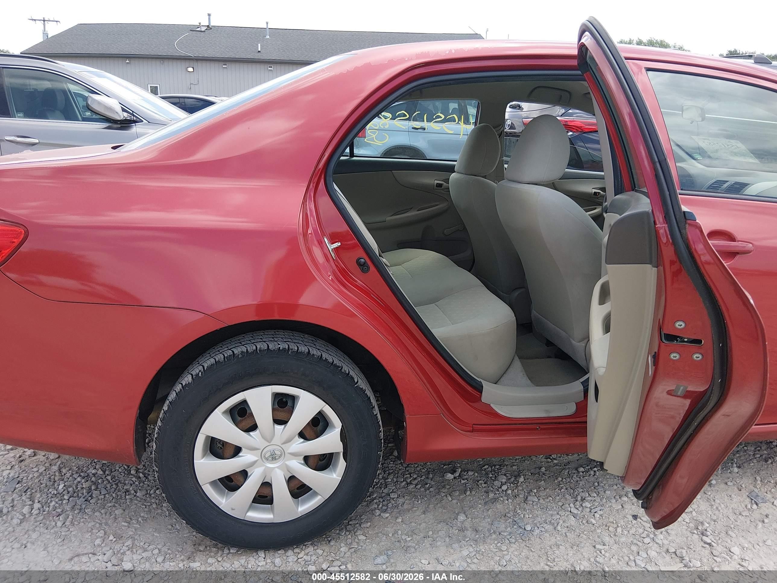 2010 Toyota Corolla   Red vin: 1NXBU4EE4AZ246838