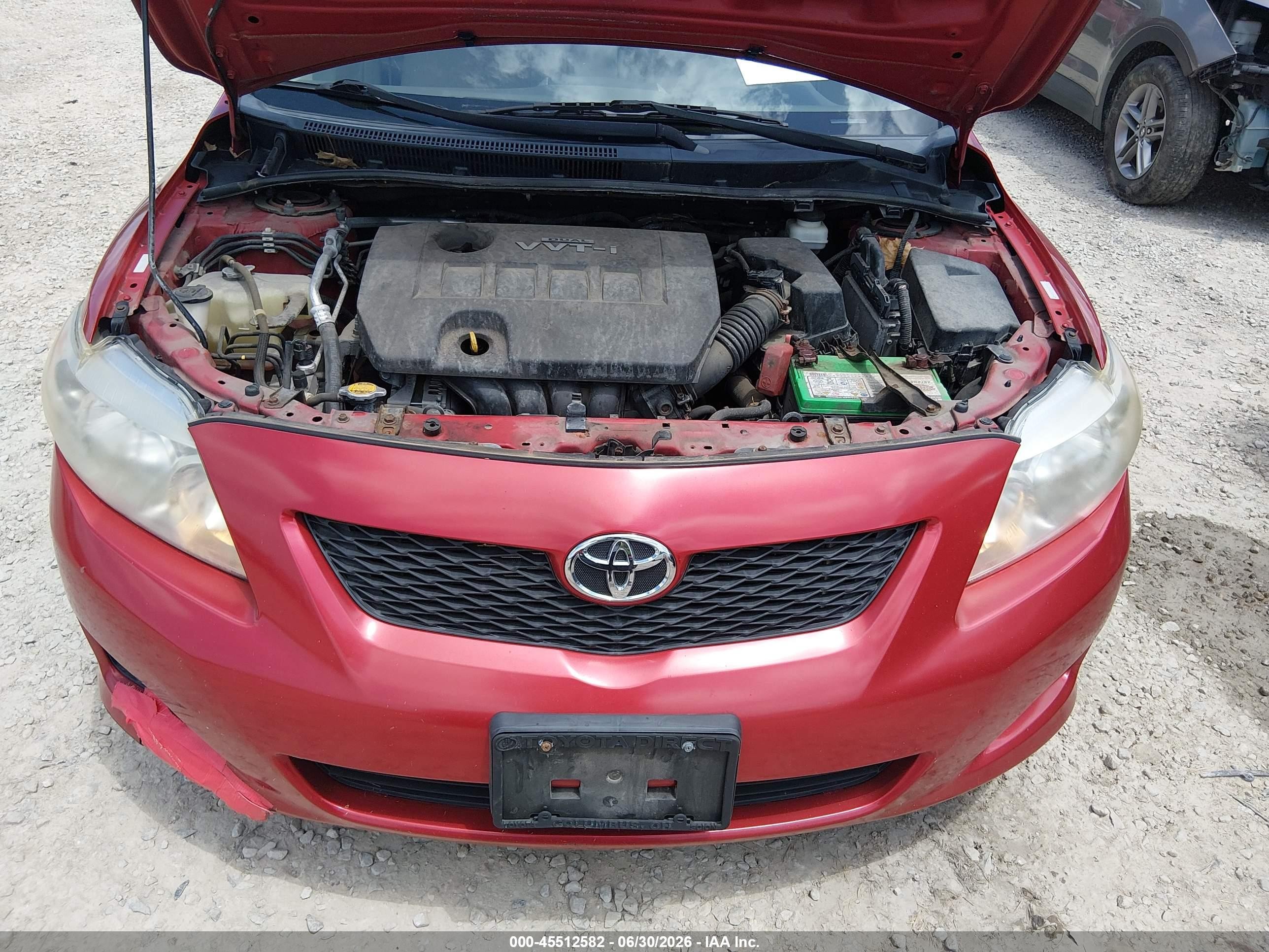 2010 Toyota Corolla   Red vin: 1NXBU4EE4AZ246838
