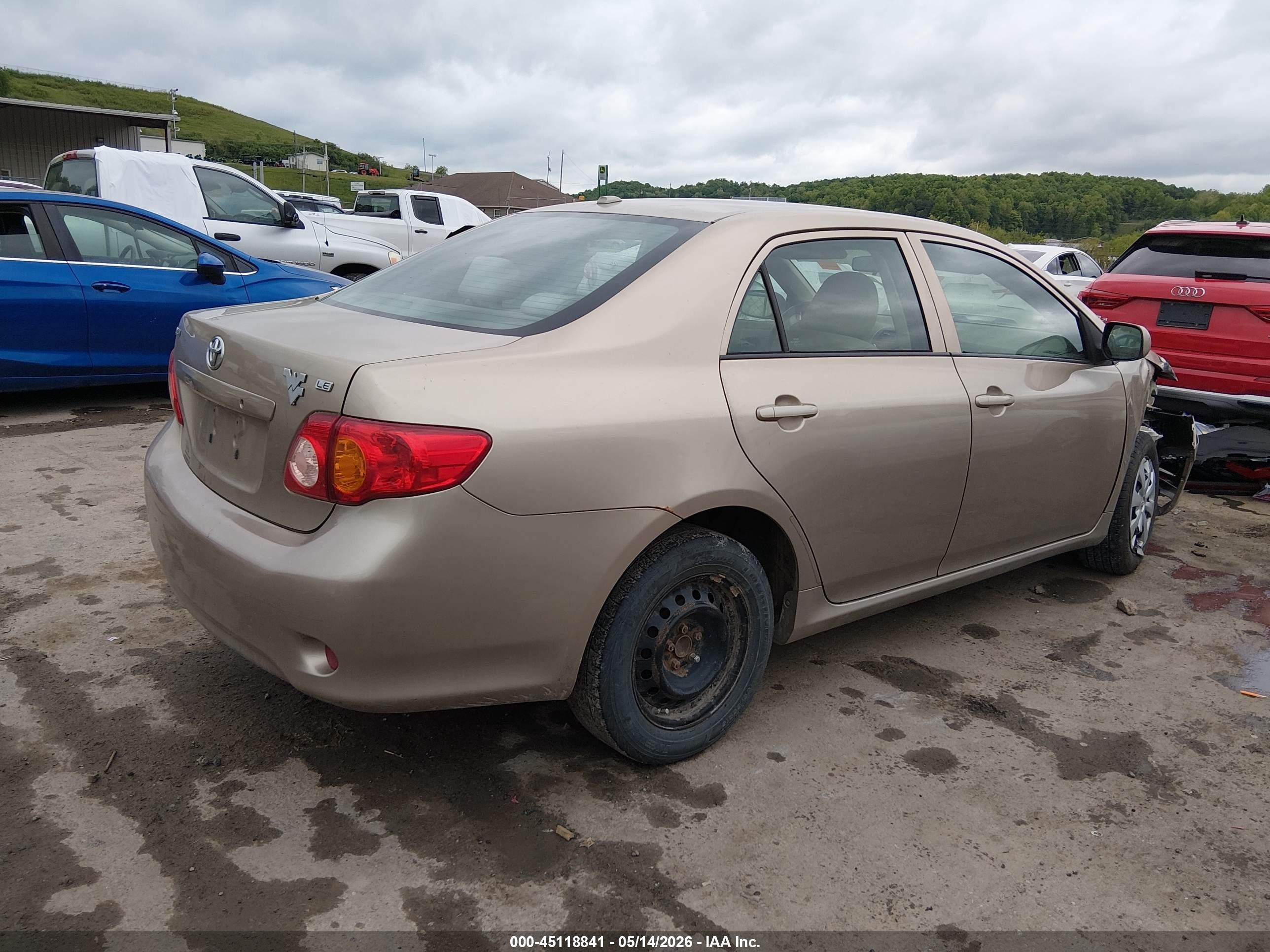 2010 Toyota Corolla Le Gold vin: 1NXBU4EE5AZ208597