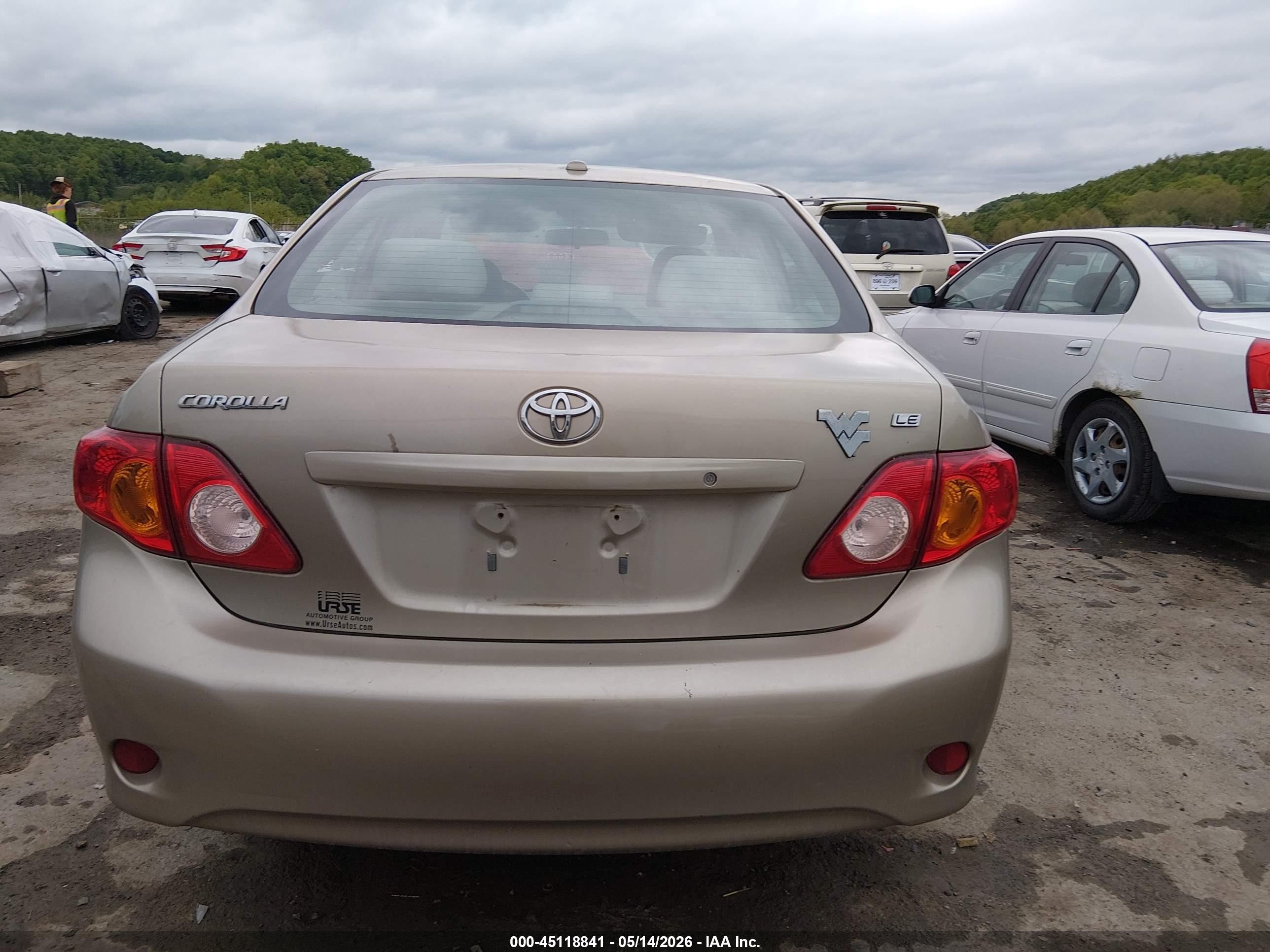 2010 Toyota Corolla Le Gold vin: 1NXBU4EE5AZ208597