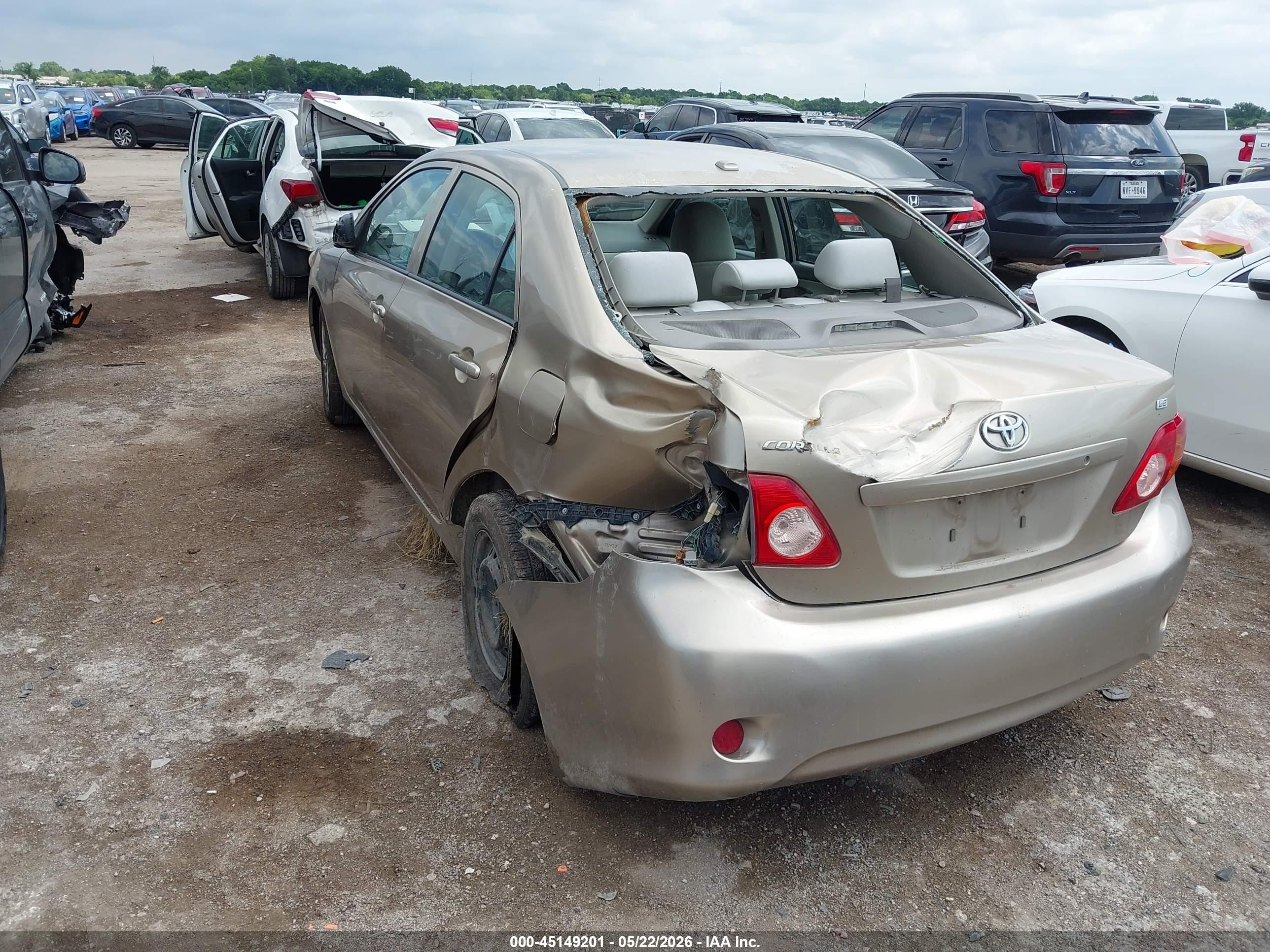 2010 Toyota Corolla Le Gold vin: 1NXBU4EE5AZ285258