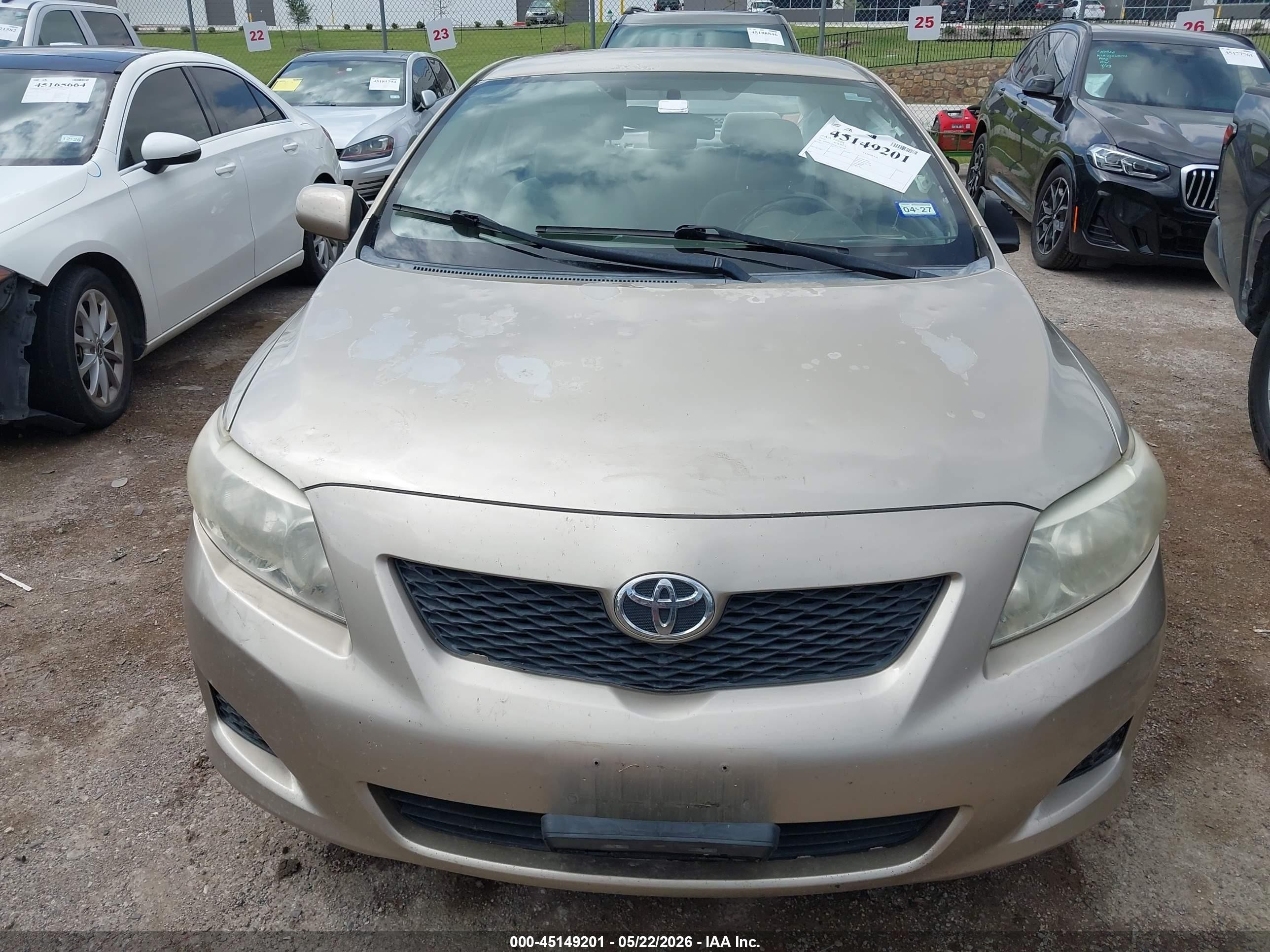 2010 Toyota Corolla Le Gold vin: 1NXBU4EE5AZ285258