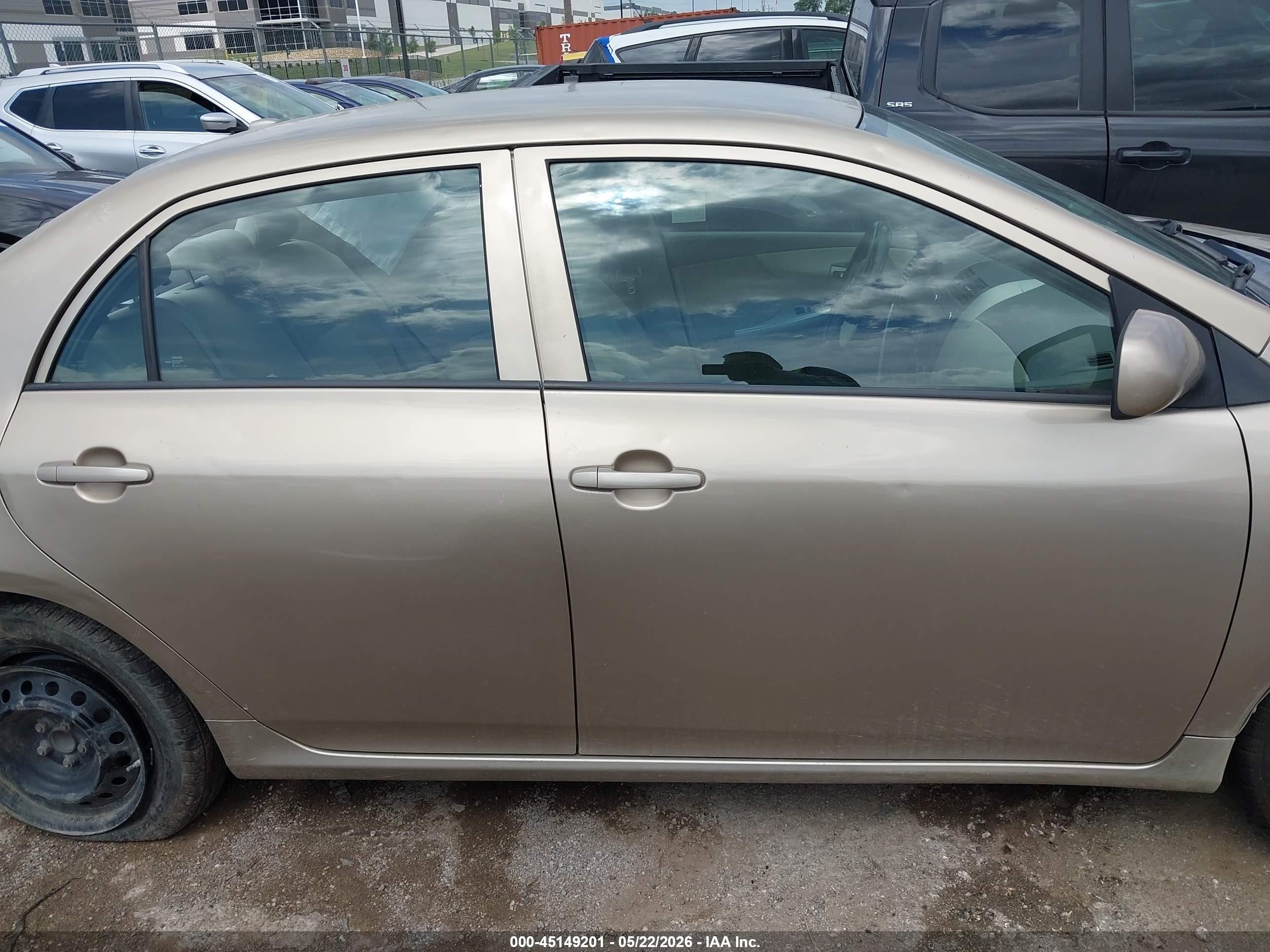 2010 Toyota Corolla Le Gold vin: 1NXBU4EE5AZ285258