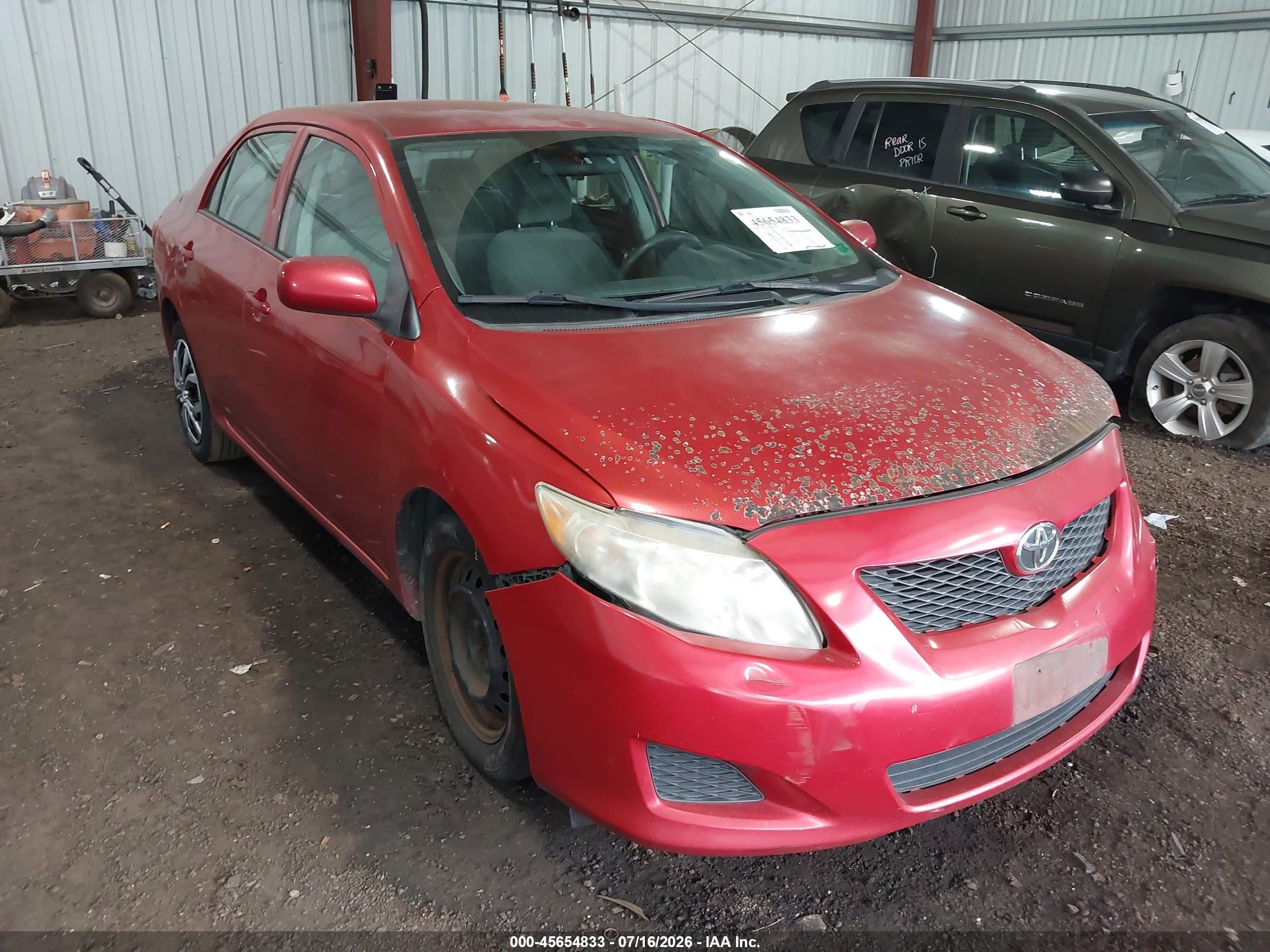 2010 Toyota Corolla Le Red vin: 1NXBU4EE5AZ308313