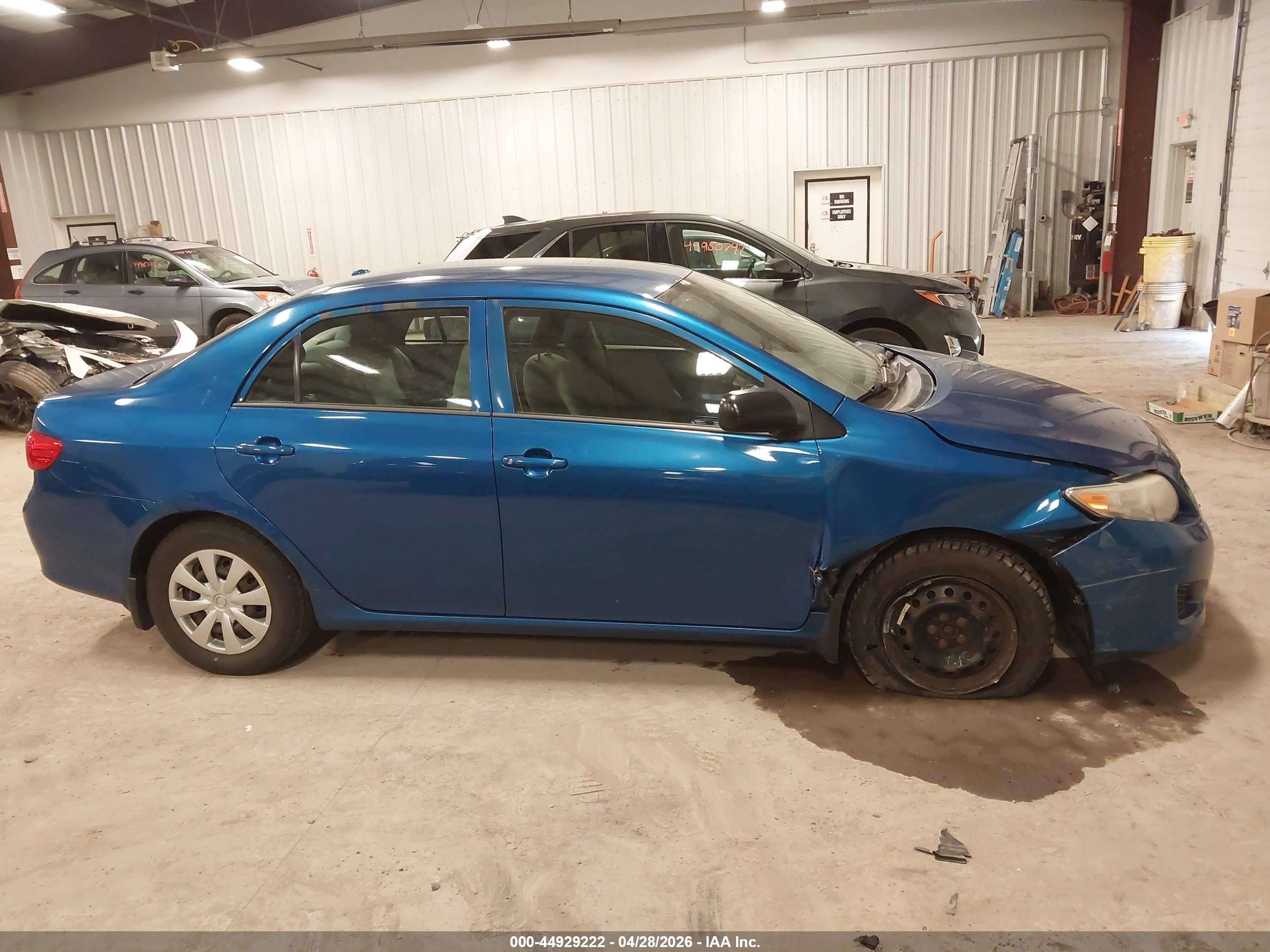2010 Toyota Corolla   Blue vin: 1NXBU4EE5AZ336693