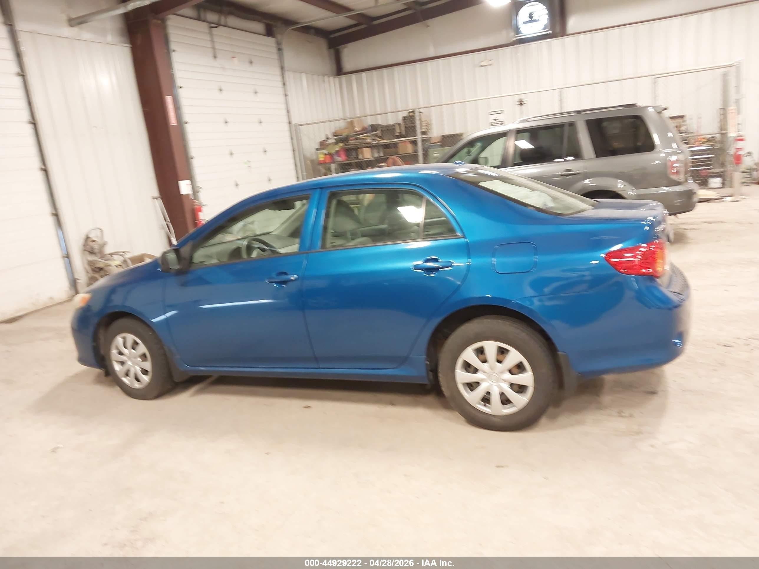 2010 Toyota Corolla   Blue vin: 1NXBU4EE5AZ336693