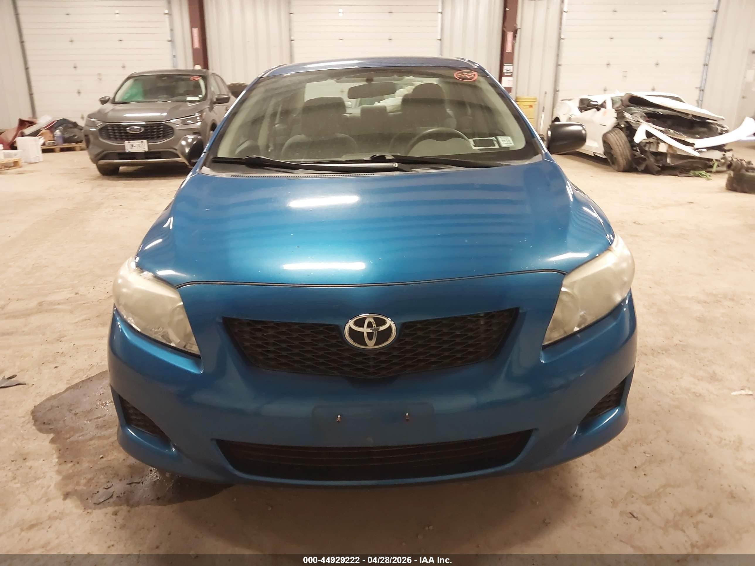 2010 Toyota Corolla   Blue vin: 1NXBU4EE5AZ336693