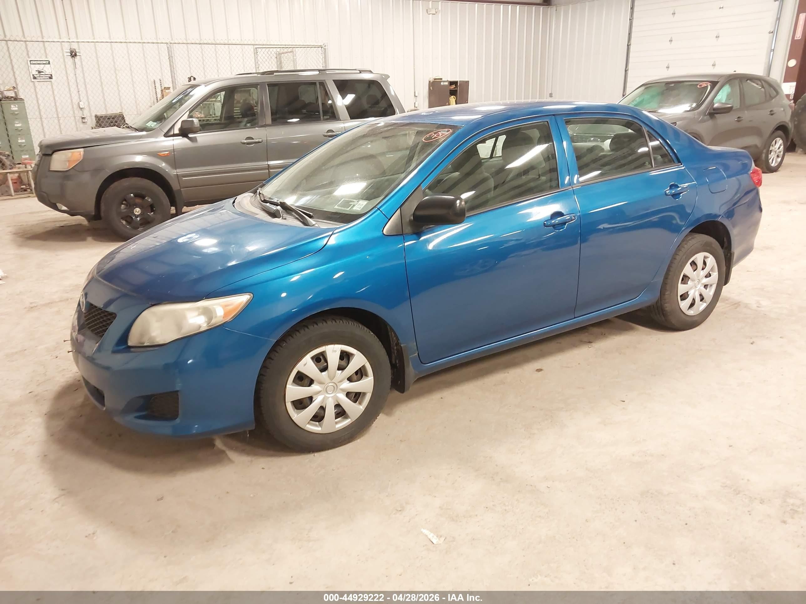 2010 Toyota Corolla   Blue vin: 1NXBU4EE5AZ336693