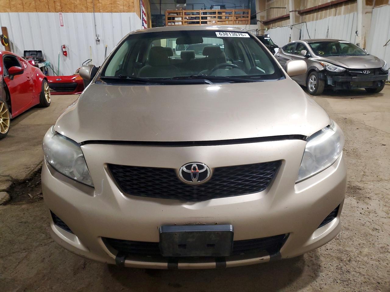 2010 Toyota Corolla Le Золотой vin: 1NXBU4EE6AZ281977