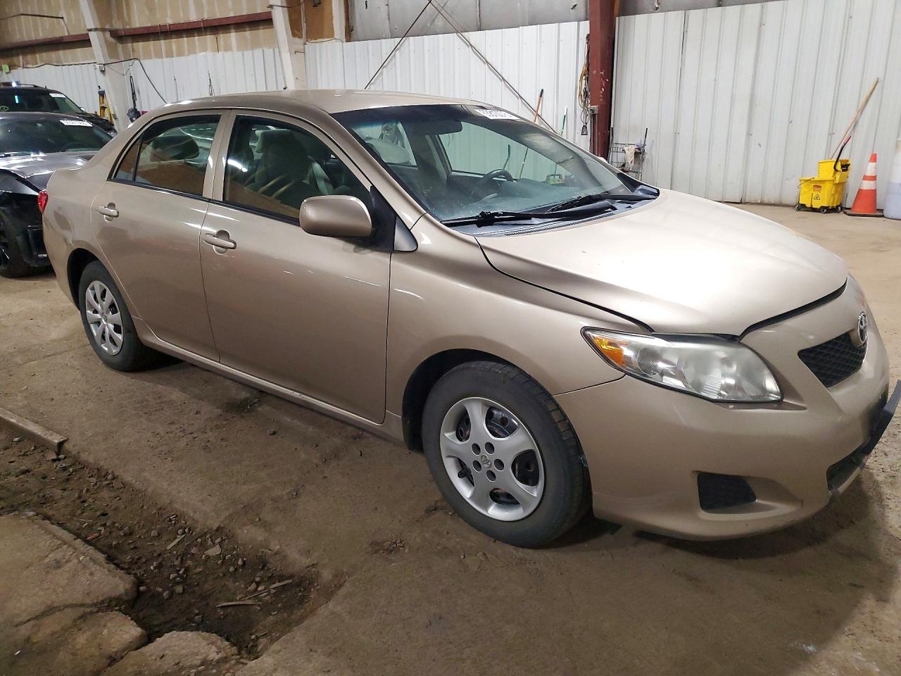 2010 Toyota Corolla Le Золотой vin: 1NXBU4EE6AZ281977