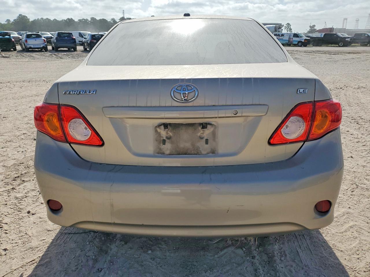 2010 Toyota Corolla Le Gold vin: 1NXBU4EE6AZ284006