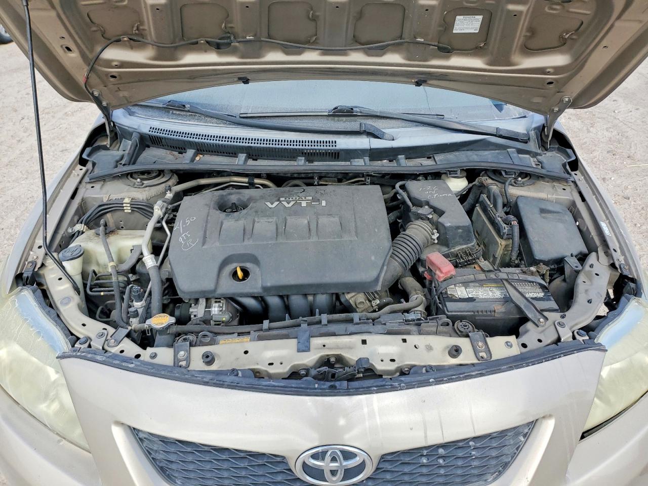 2010 Toyota Corolla Le Gold vin: 1NXBU4EE6AZ284006
